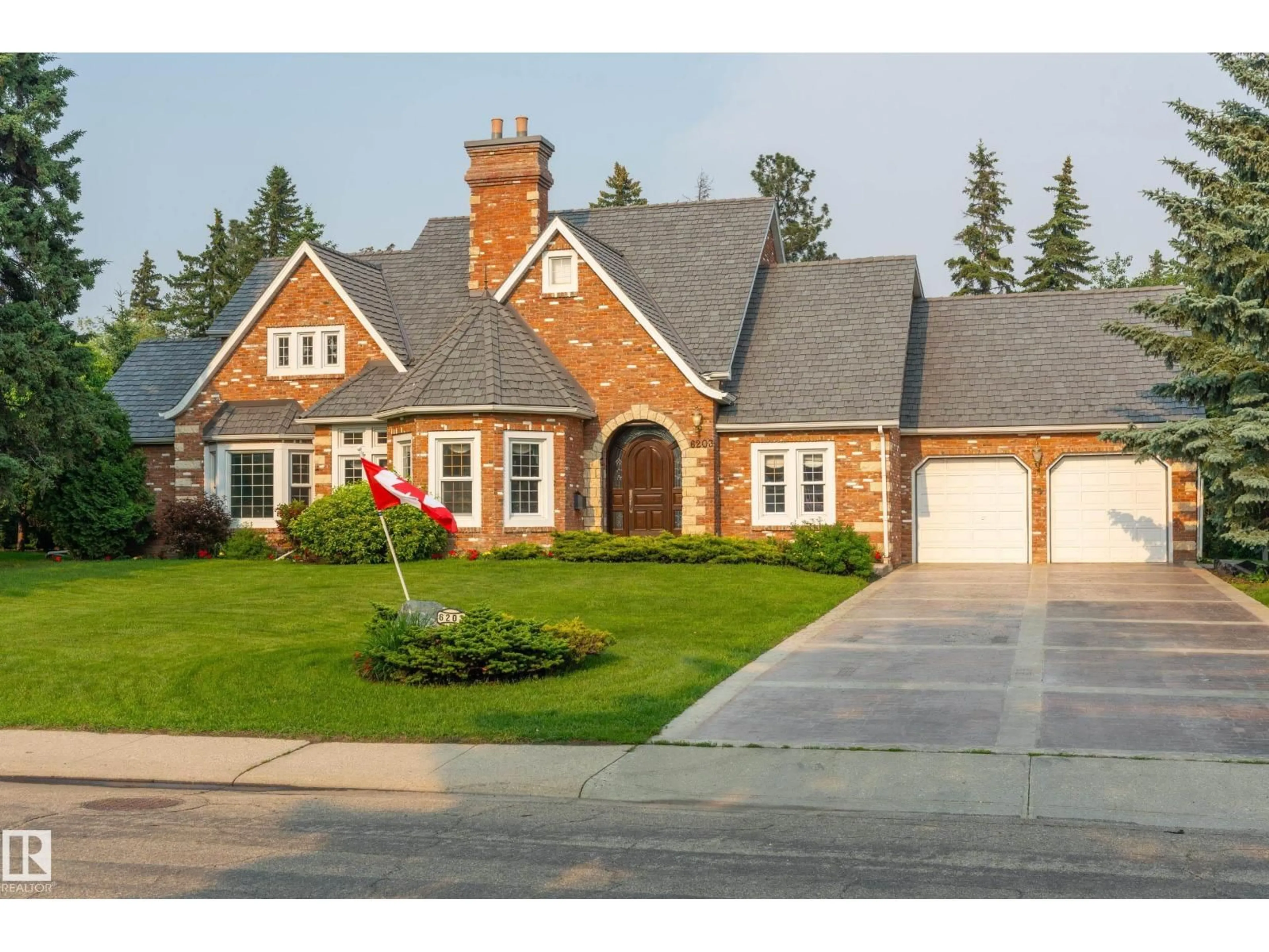 Home with brick exterior material, street for 6203 143 ST, Edmonton Alberta T6H4W7