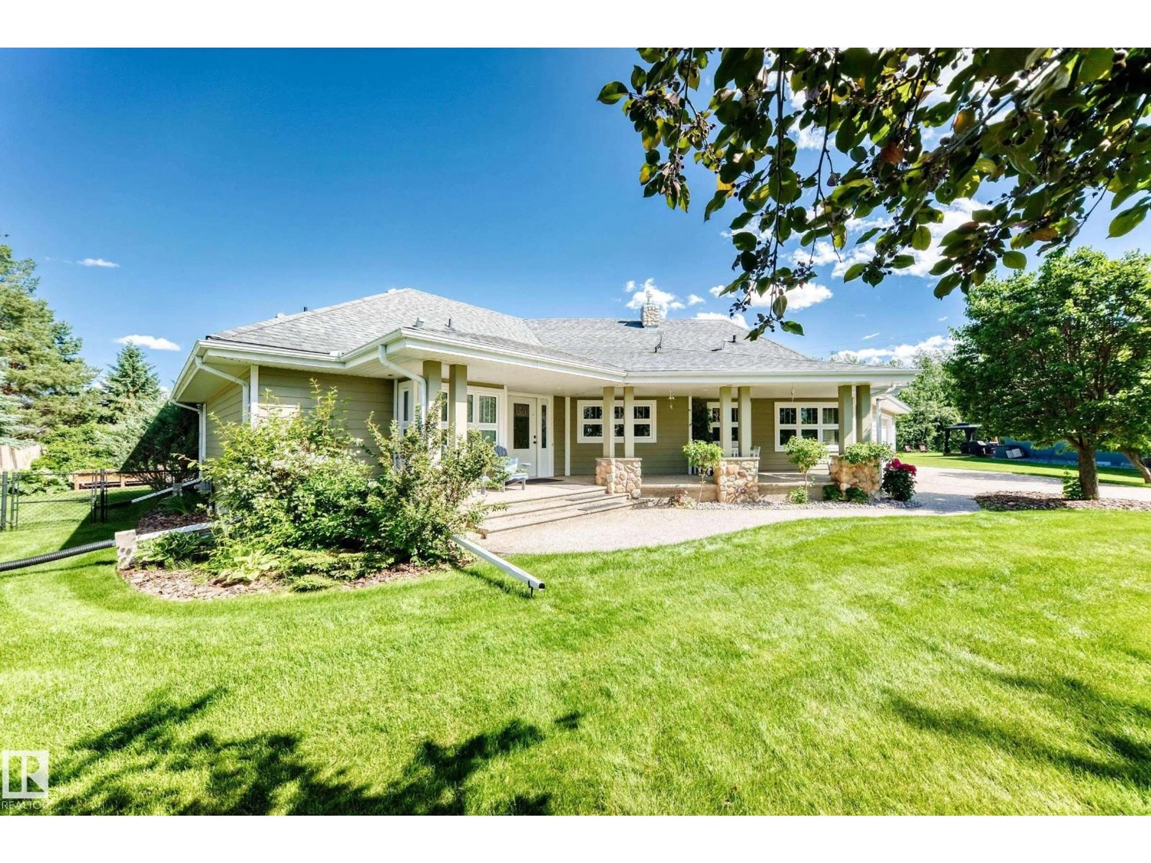 A pic from outside/outdoor area/front of a property/back of a property/a pic from drone, unknown for 51 26106 TWP ROAD 532 A, Rural Parkland County Alberta T7Y1A3