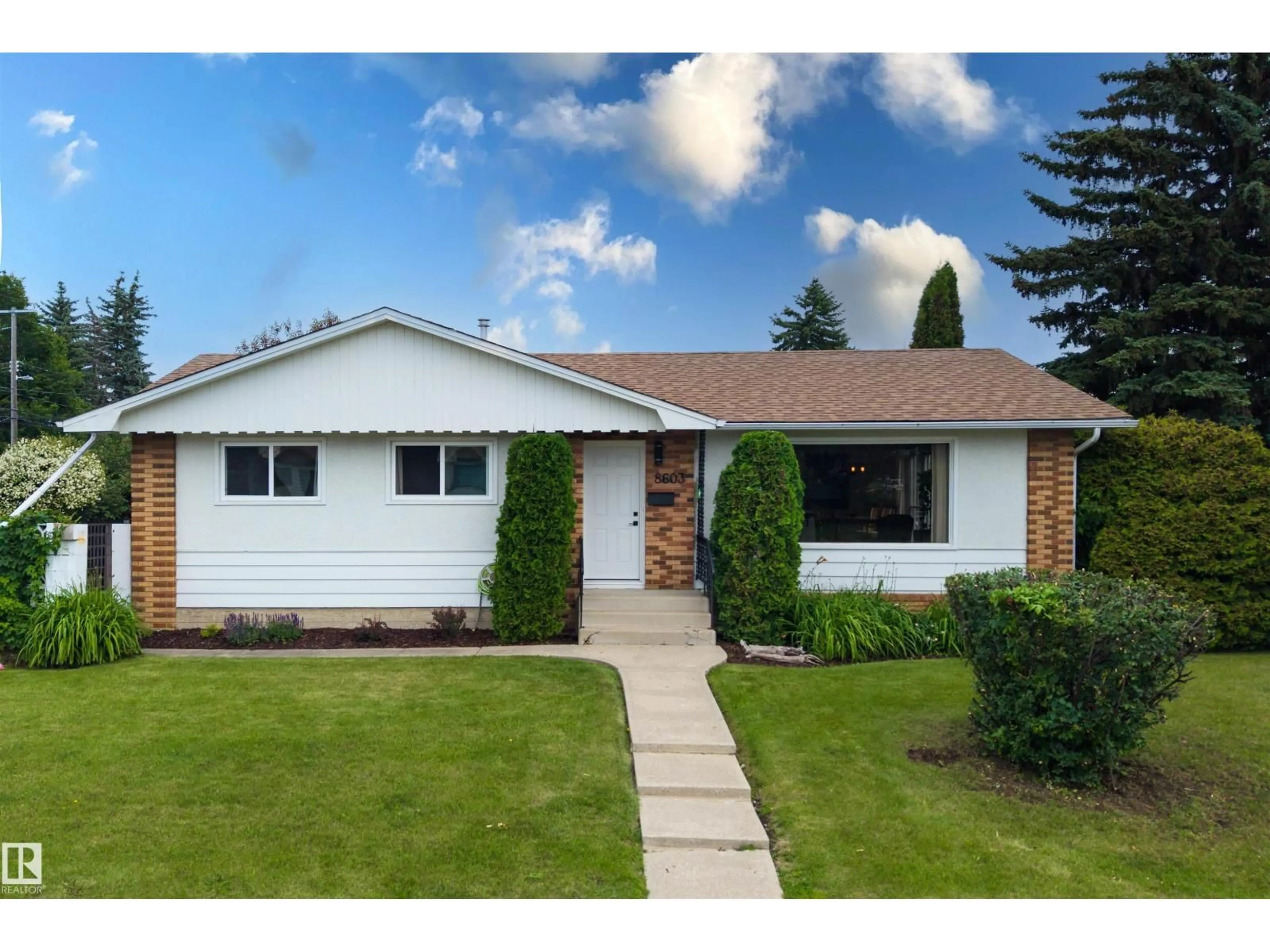Home with vinyl exterior material, street for 8603 73 ST, Edmonton Alberta T6B1Z9