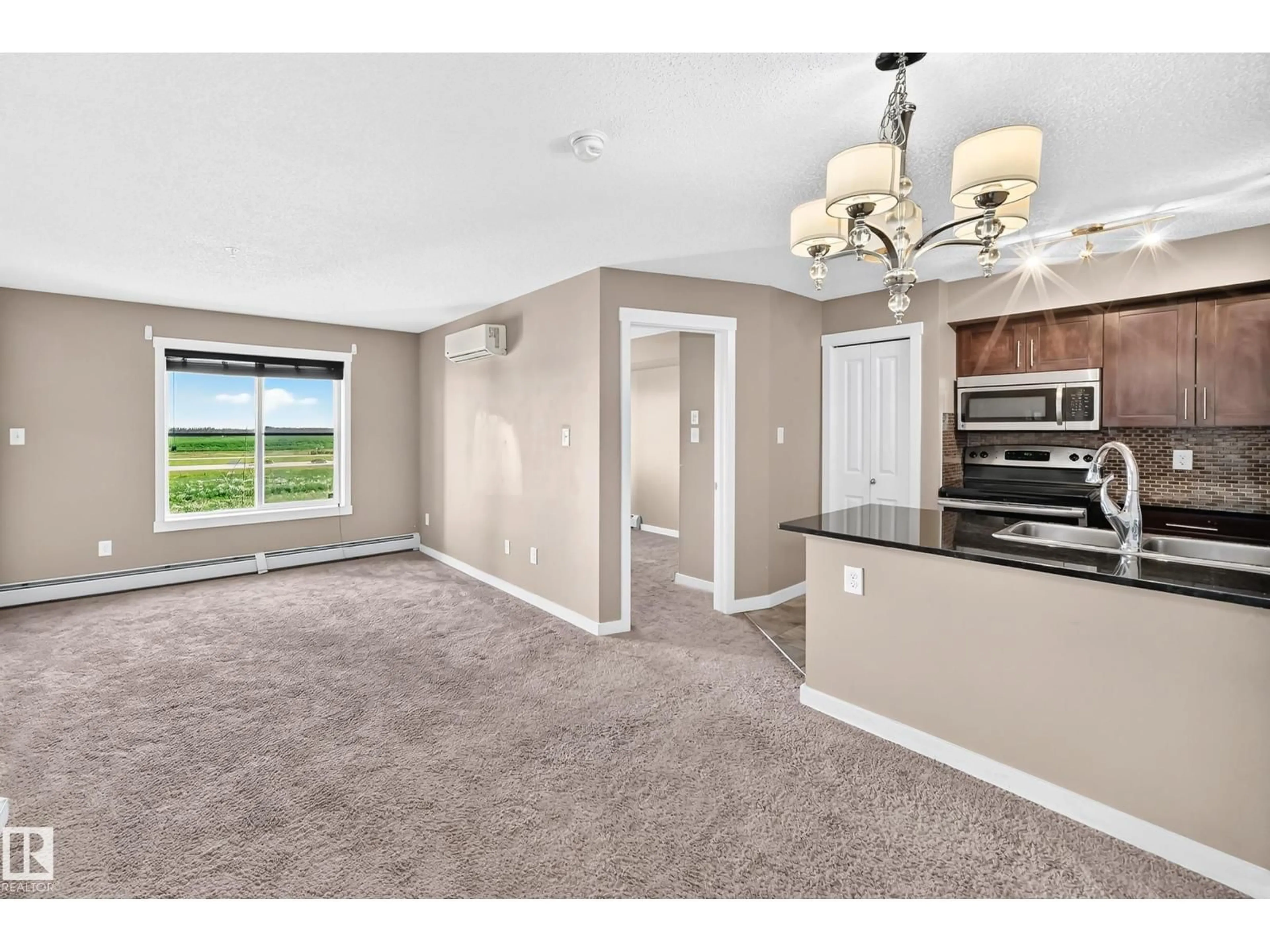 Open concept kitchen, unknown for #308 - 18126 77 ST NW, Edmonton Alberta T5Z0N7