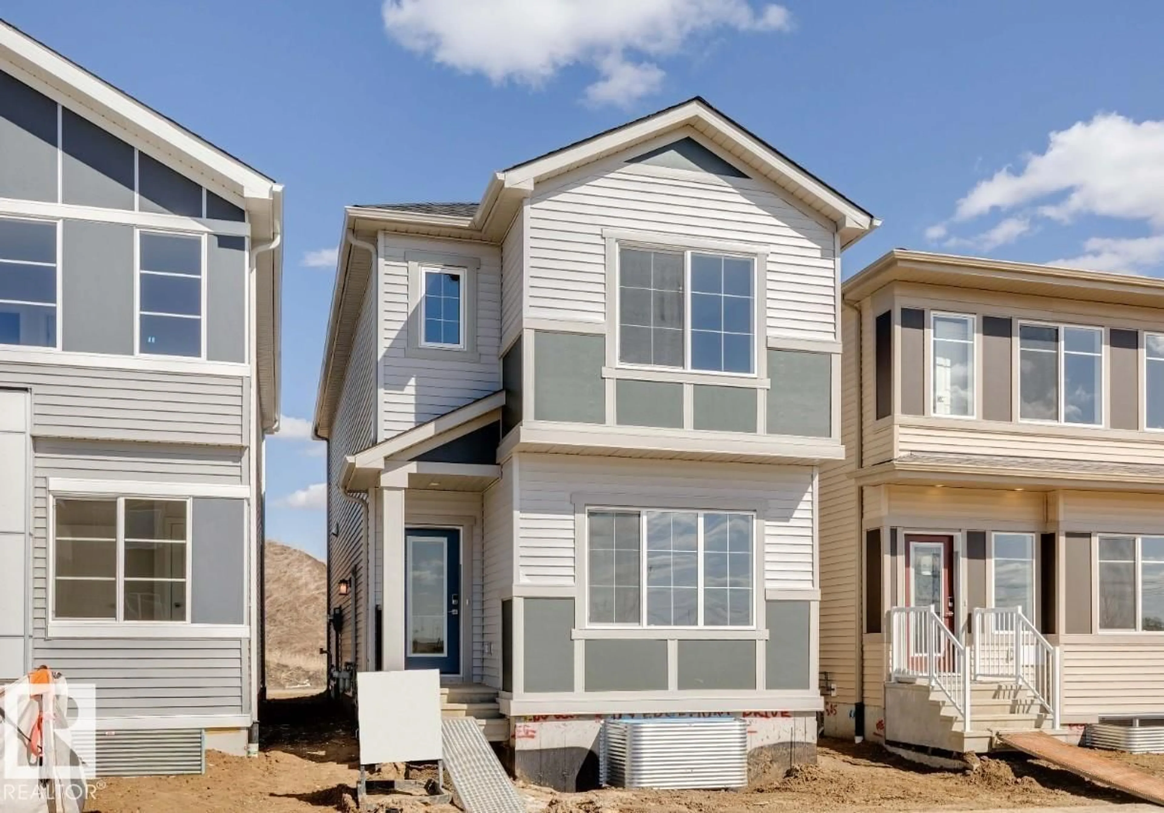 Home with vinyl exterior material, street for 309 EDGEMONT DR, Edmonton Alberta T6M3G7