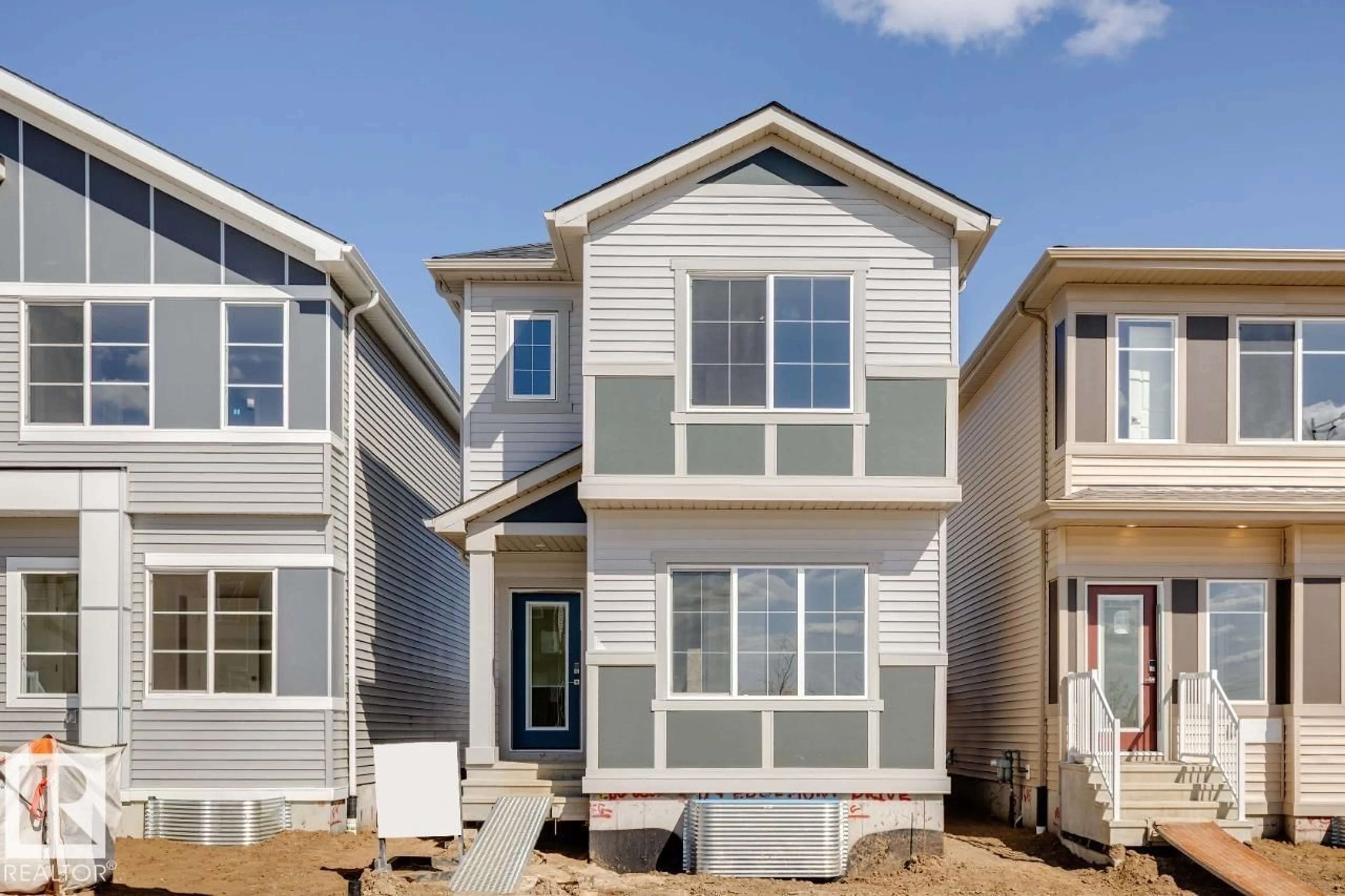 Home with vinyl exterior material, street for 309 EDGEMONT DR, Edmonton Alberta T6M3G7