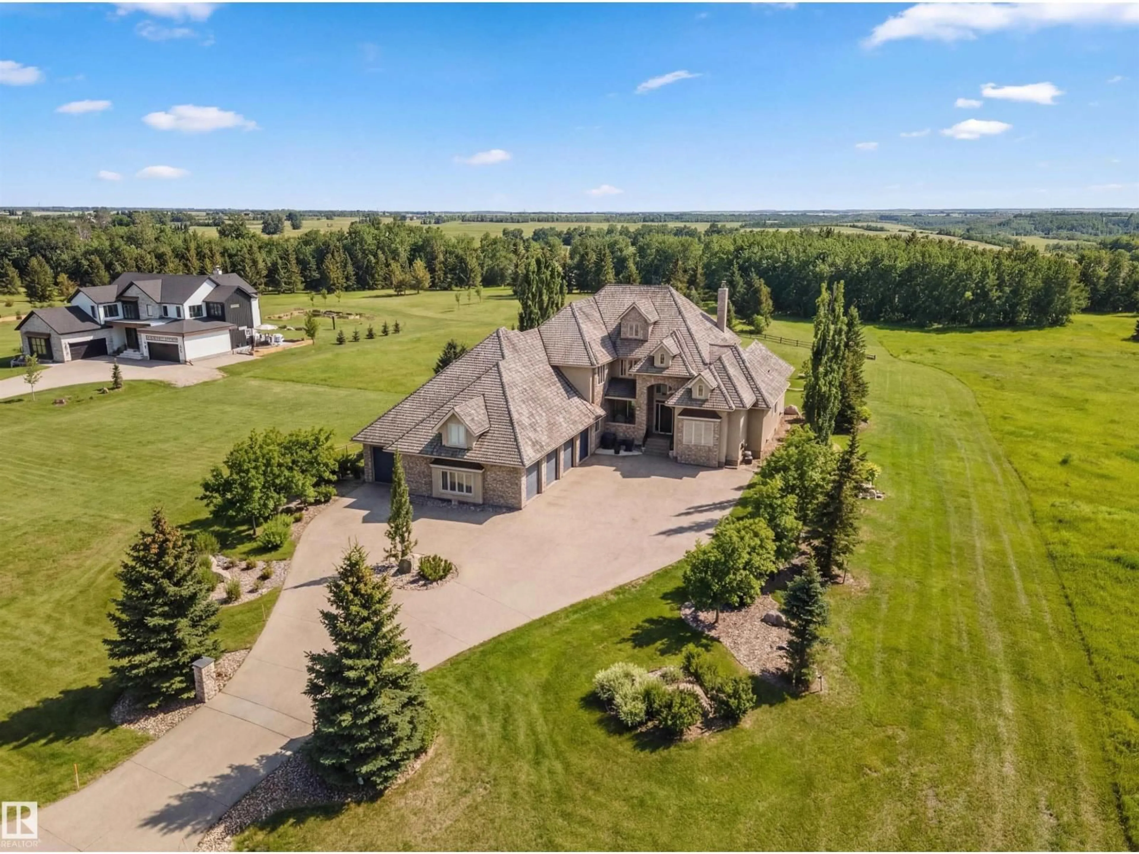A pic from outside/outdoor area/front of a property/back of a property/a pic from drone, unknown for 25515 TWP ROAD 511 A, Rural Parkland County Alberta T7Y1A8