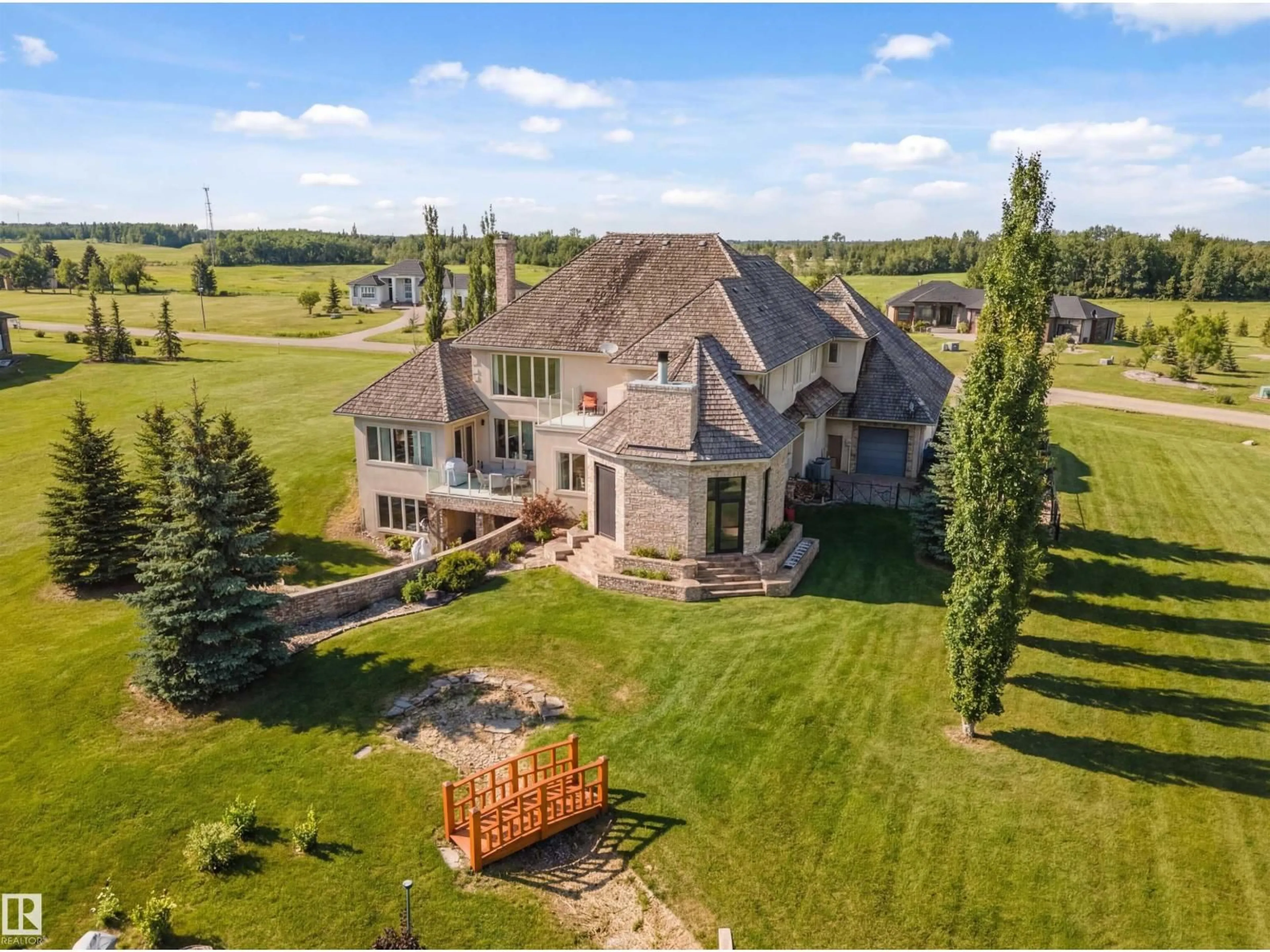 A pic from outside/outdoor area/front of a property/back of a property/a pic from drone, unknown for 25515 TWP ROAD 511 A, Rural Parkland County Alberta T7Y1A8