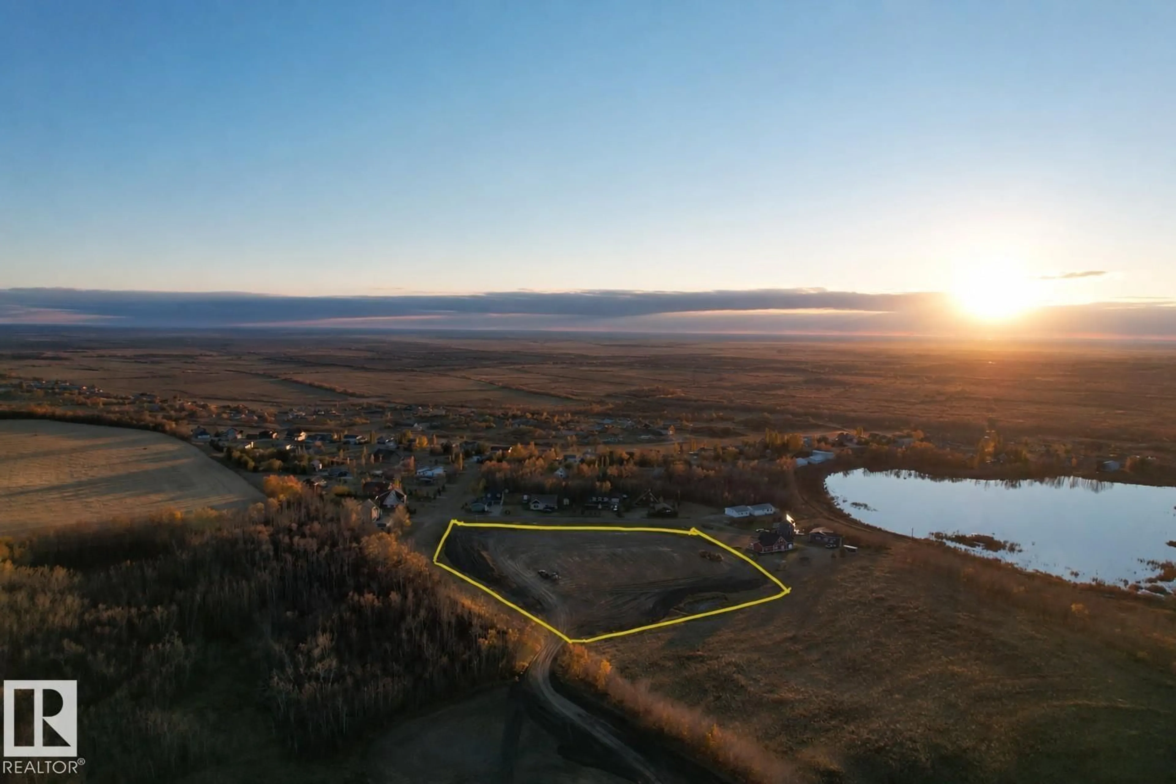 A pic from outside/outdoor area/front of a property/back of a property/a pic from drone, water/lake/river/ocean view for 41251 RANGE ROAD 210, Rural Camrose County Alberta T0B0H0