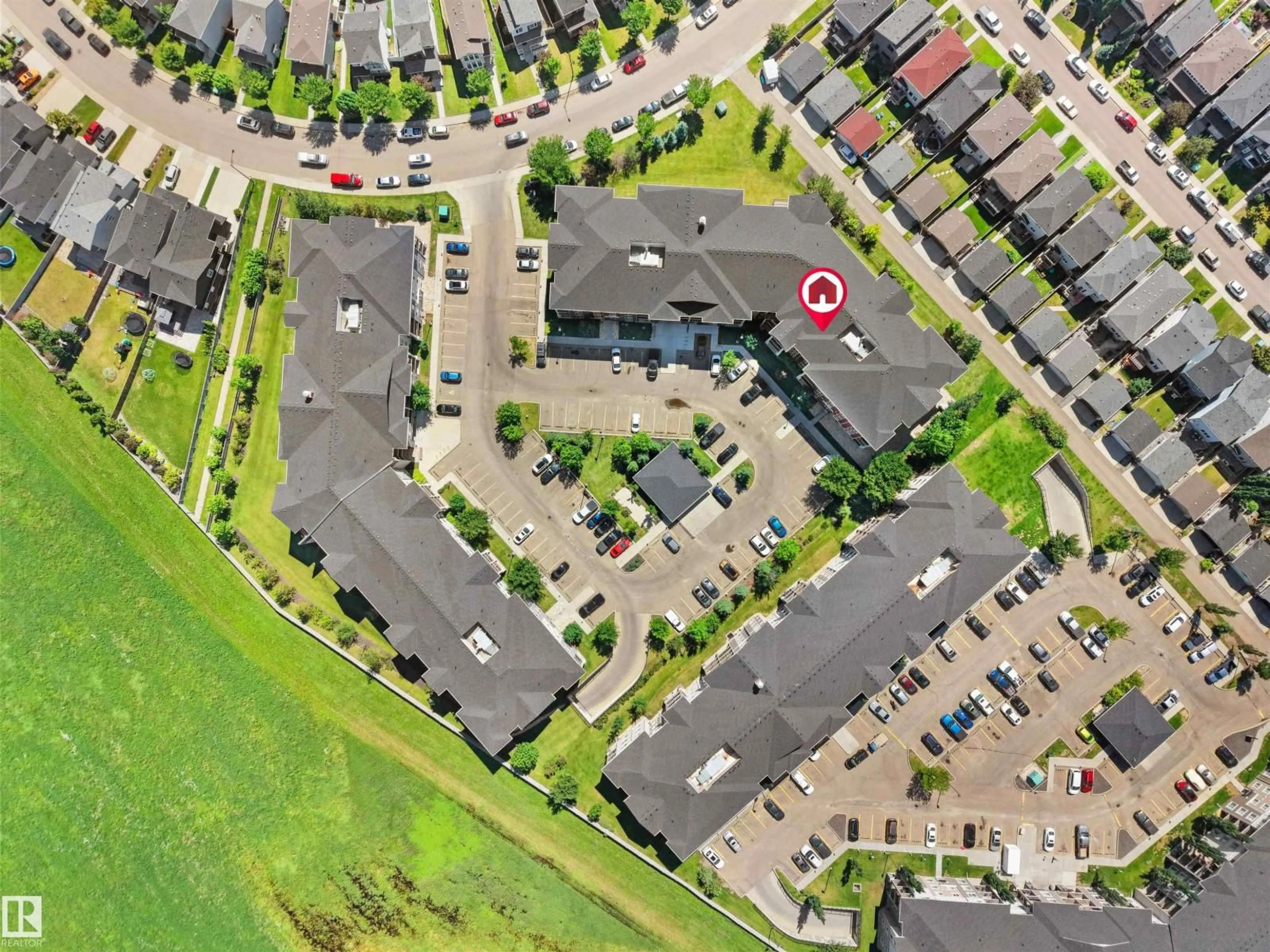 A pic from outside/outdoor area/front of a property/back of a property/a pic from drone, street for 410 18122 77 ST NW, Edmonton Alberta T5Z0N7