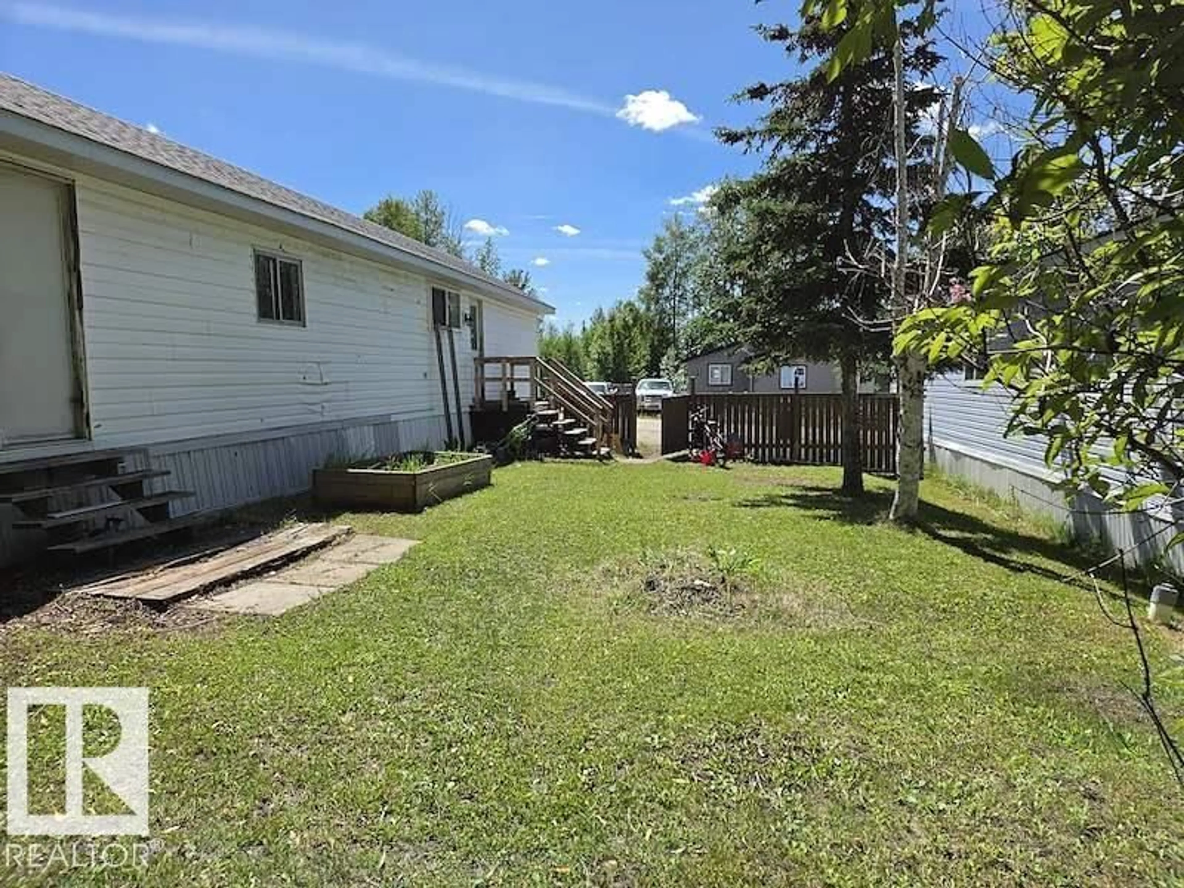 A pic from outside/outdoor area/front of a property/back of a property/a pic from drone, unknown for #66 - 2251 50 STREET, Drayton Valley Alberta T7A1M9