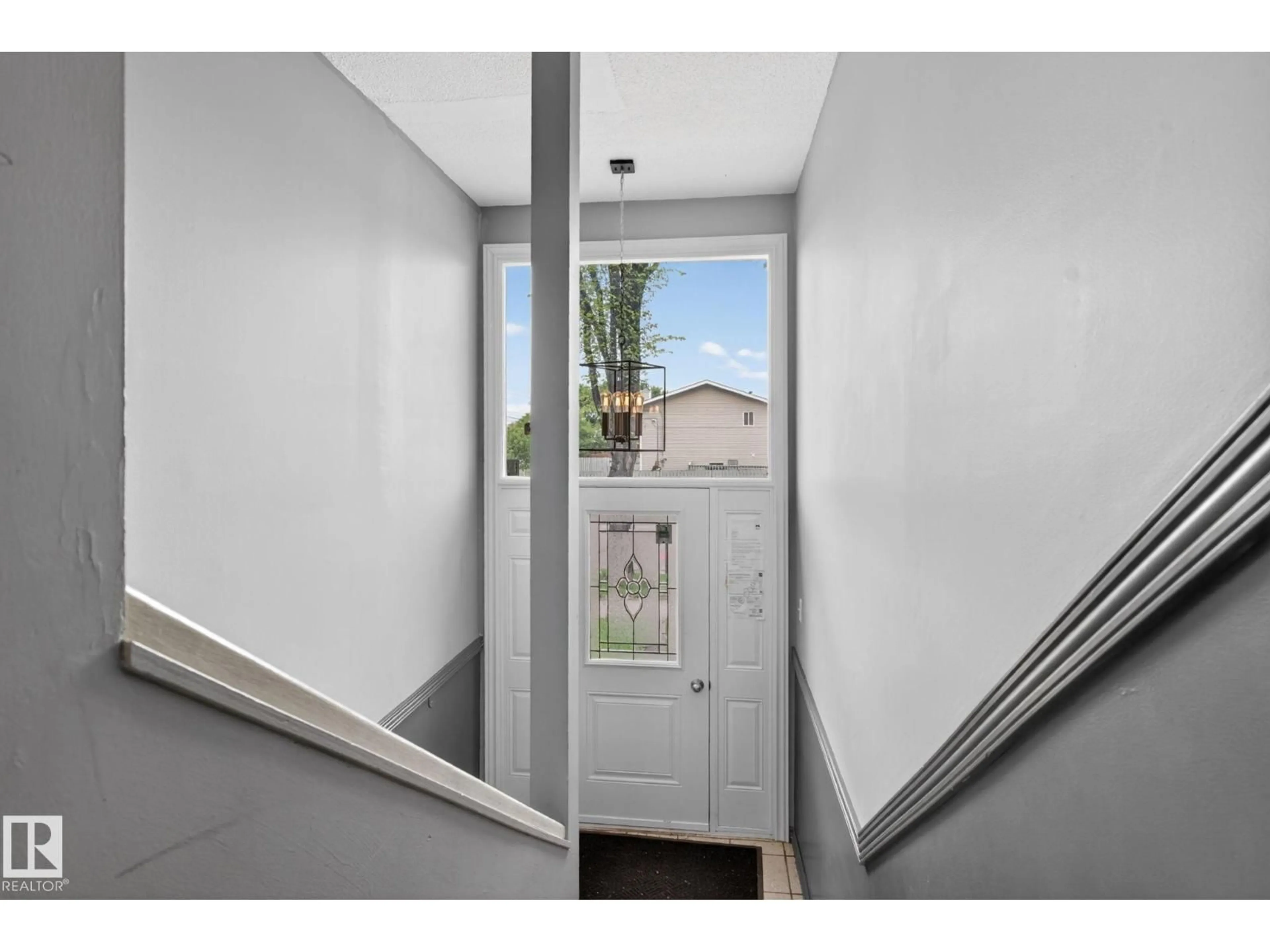 Indoor entryway for 6203 122 AV, Edmonton Alberta T5W1S7