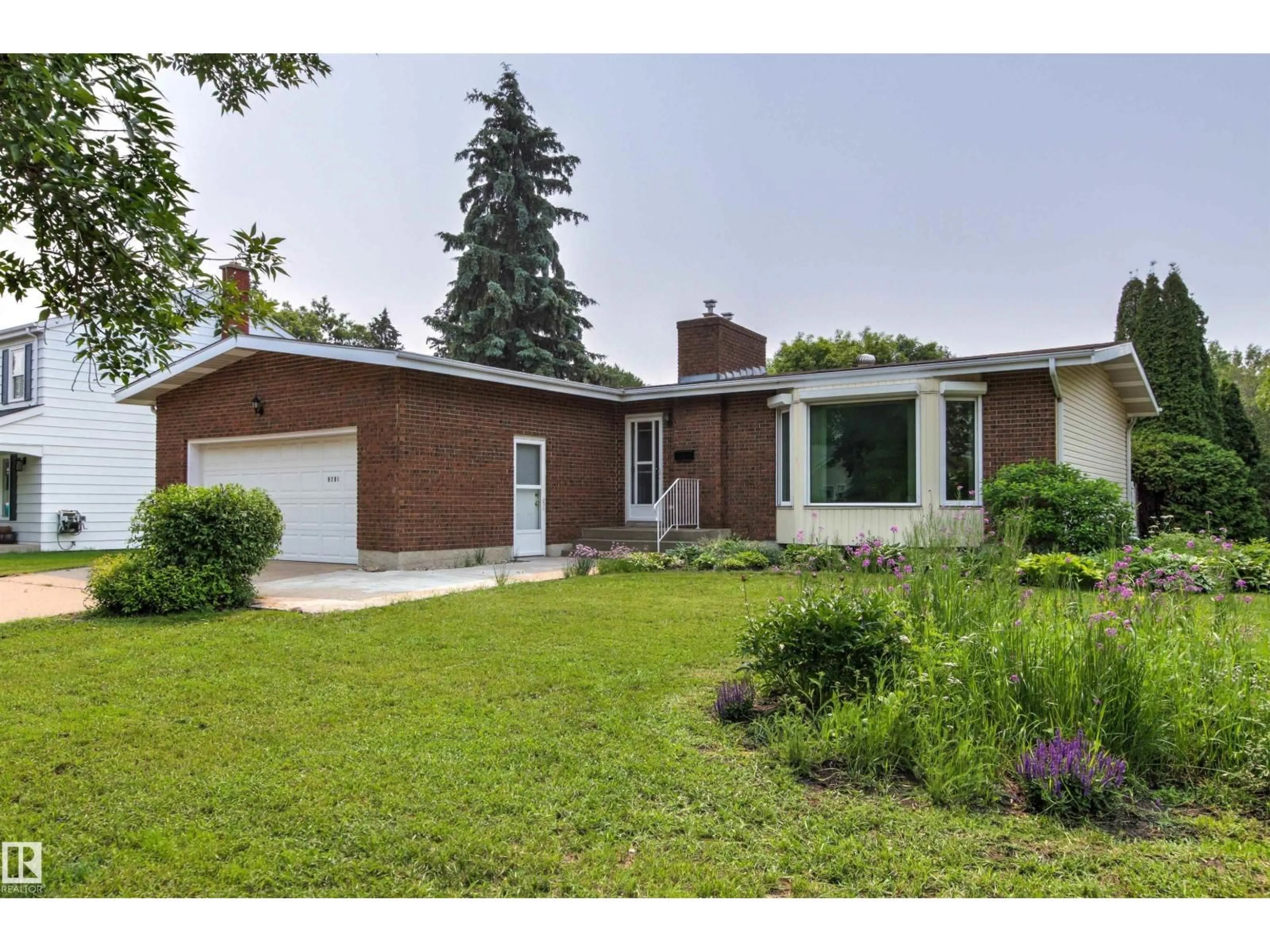 Home with brick exterior material, street for 9701 91 AV, Fort Saskatchewan Alberta T8L1M7