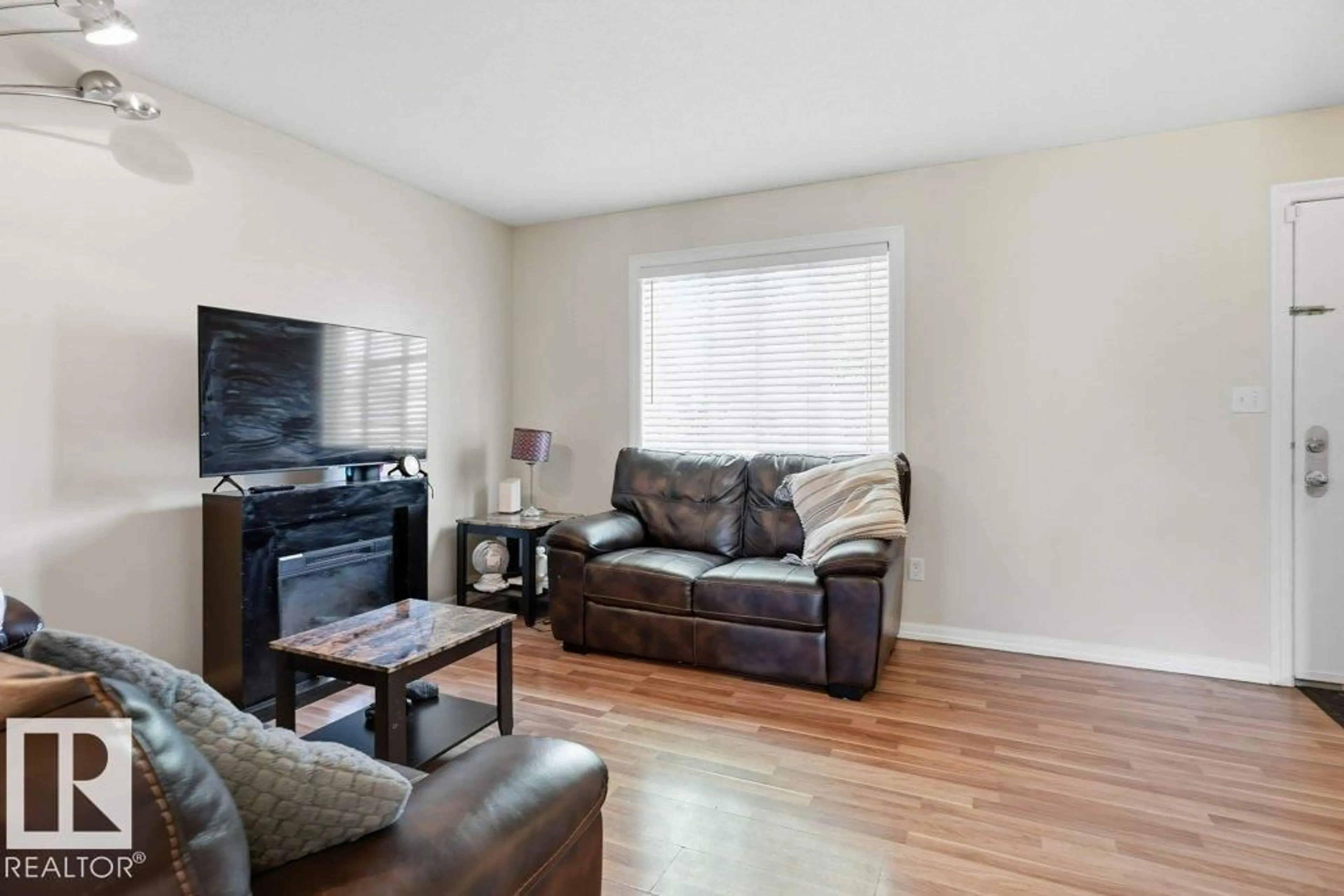 Living room with furniture, wood/laminate floor for #30 - 1404 HERMITAGE RD, Edmonton Alberta T5A0P5