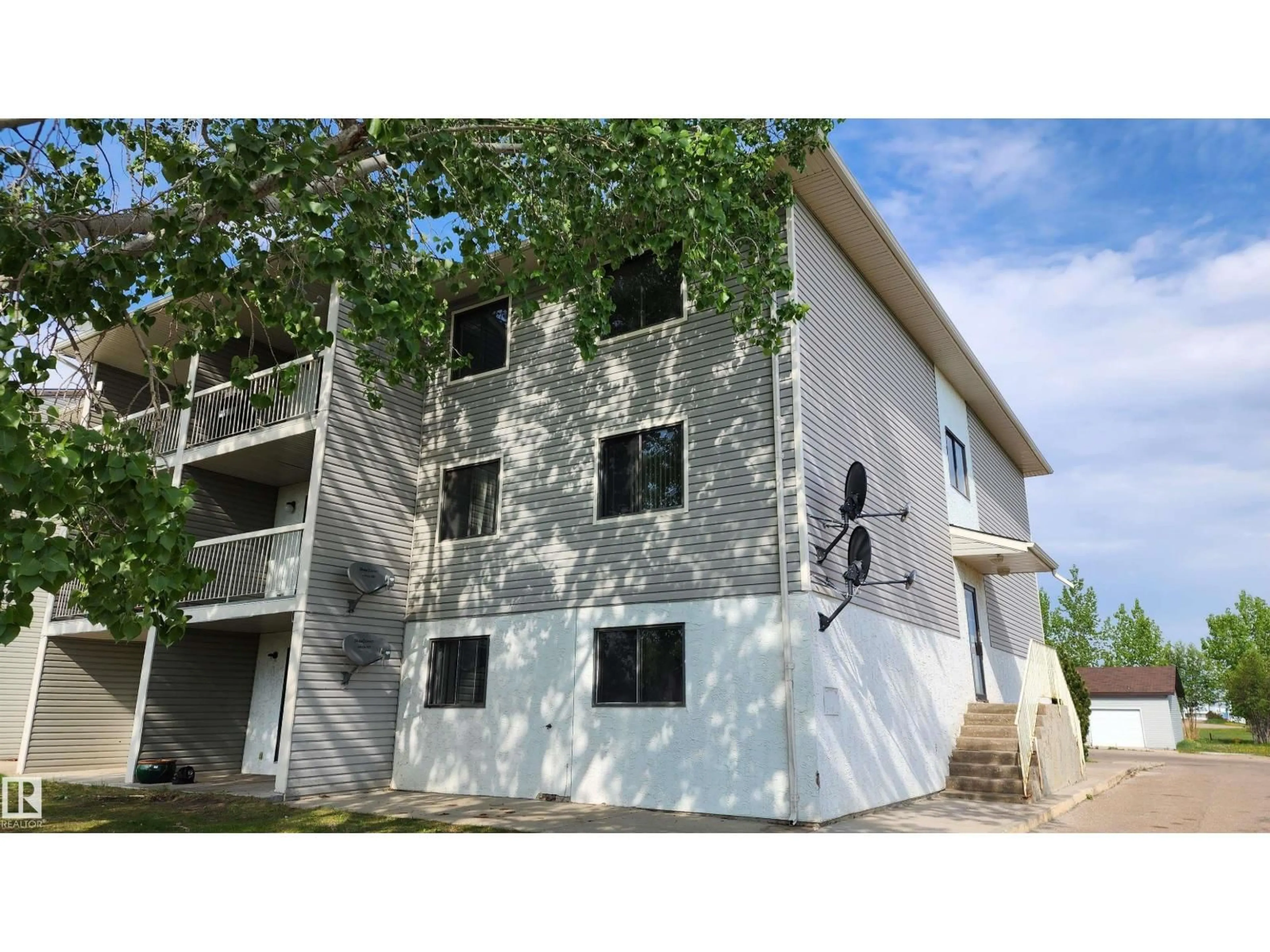 Home with vinyl exterior material, building for 304 - 5705 51 ST, Elk Point Alberta T0A1A0