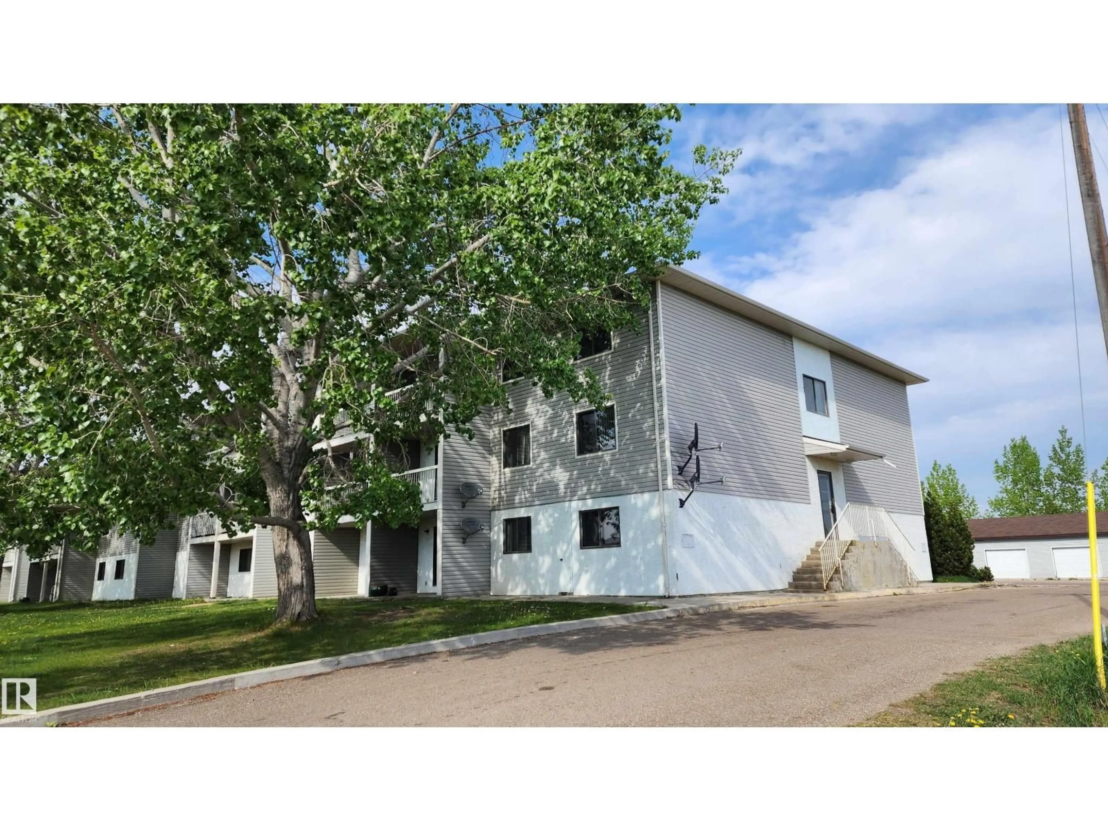 Home with vinyl exterior material, building for 304 - 5705 51 ST, Elk Point Alberta T0A1A0