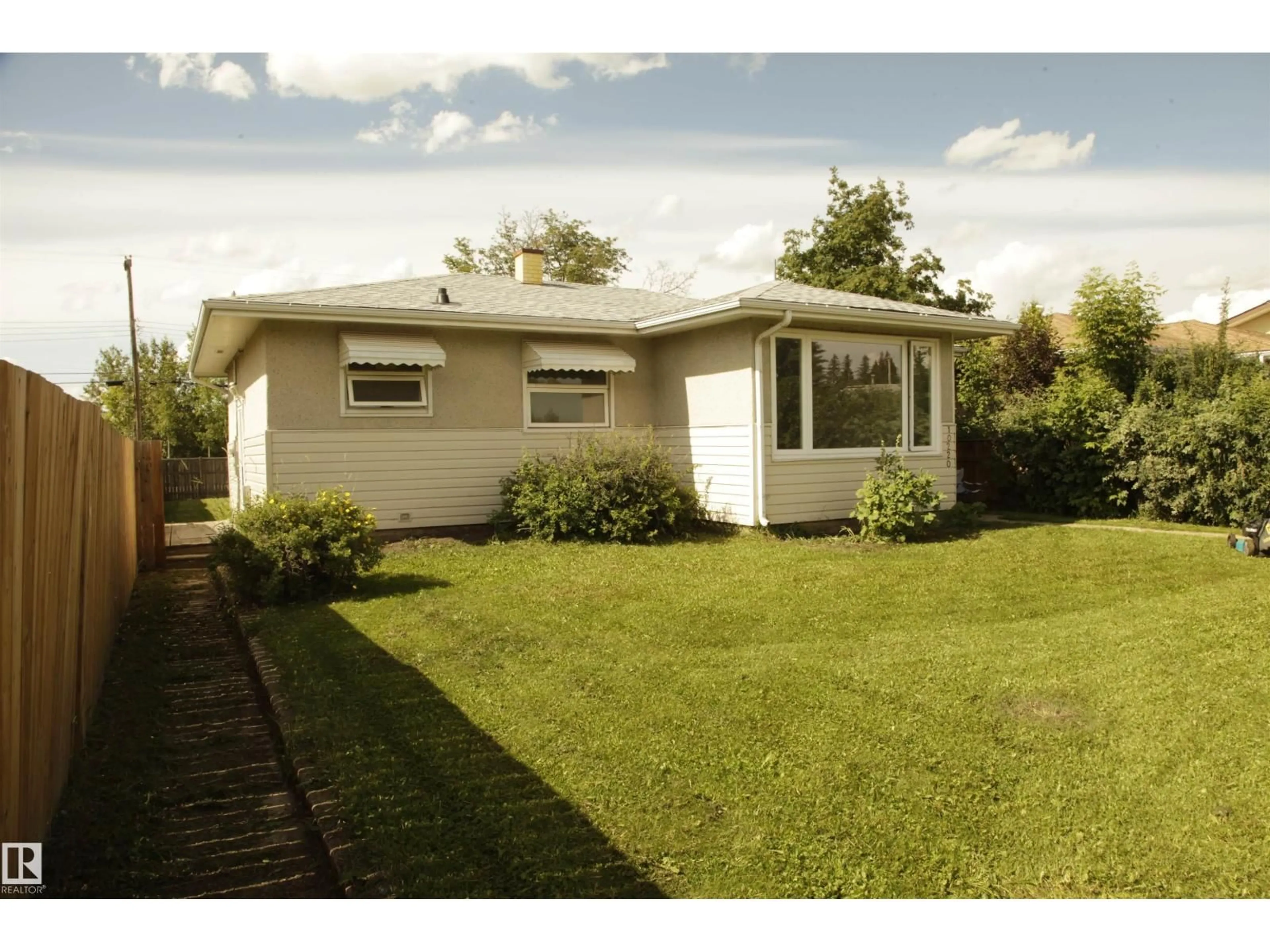 Home with vinyl exterior material, street for 10220 107 ST, Westlock Alberta T7P1X4