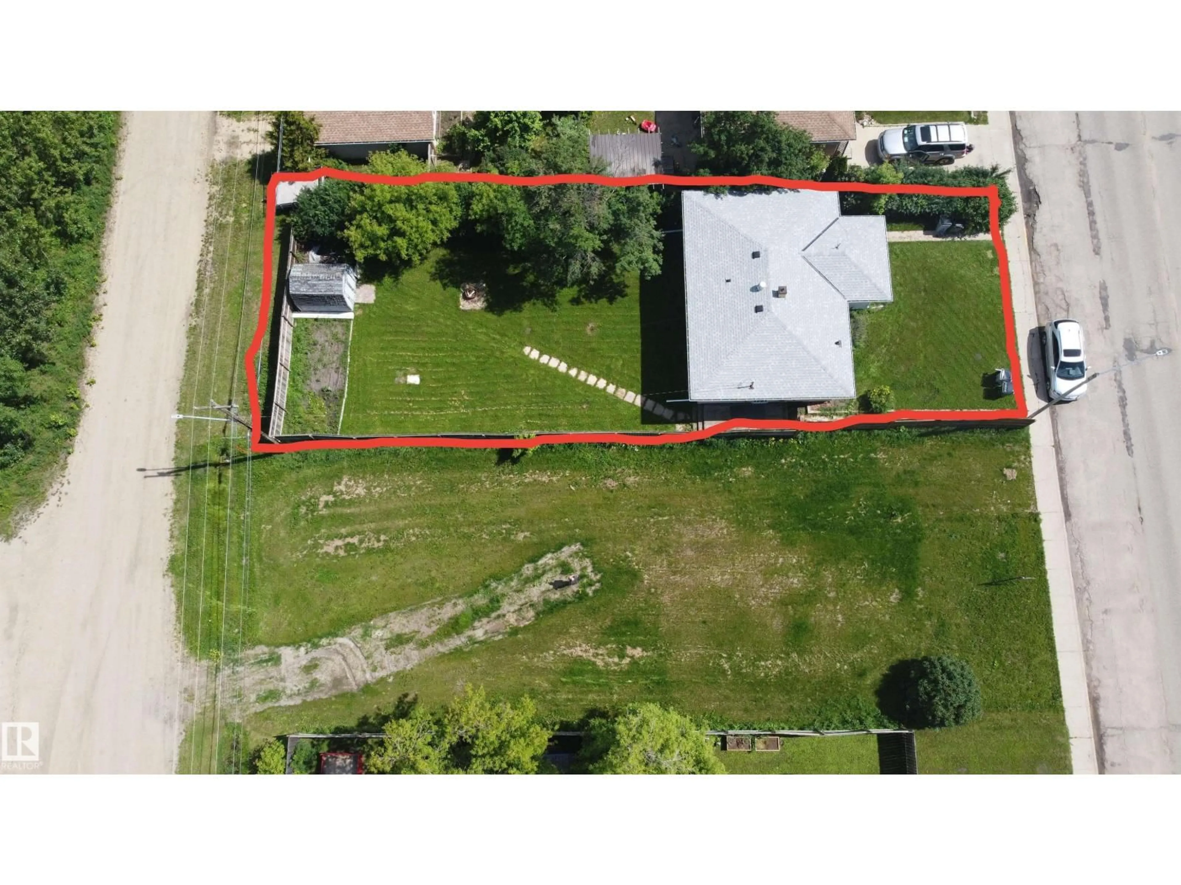 A pic from outside/outdoor area/front of a property/back of a property/a pic from drone, building for 10220 107 ST, Westlock Alberta T7P1X4