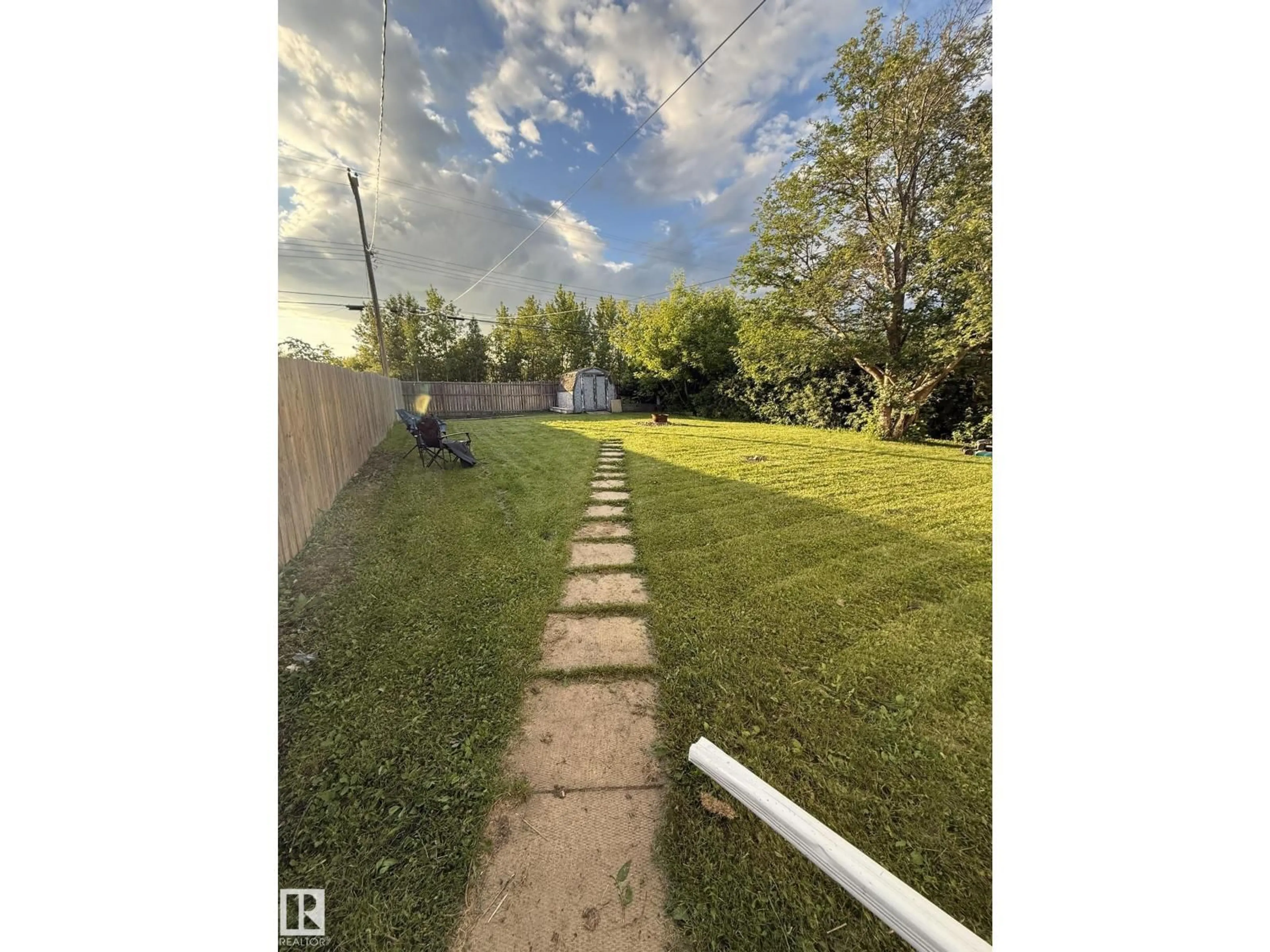 A pic from outside/outdoor area/front of a property/back of a property/a pic from drone, unknown for 10220 107 ST, Westlock Alberta T7P1X4