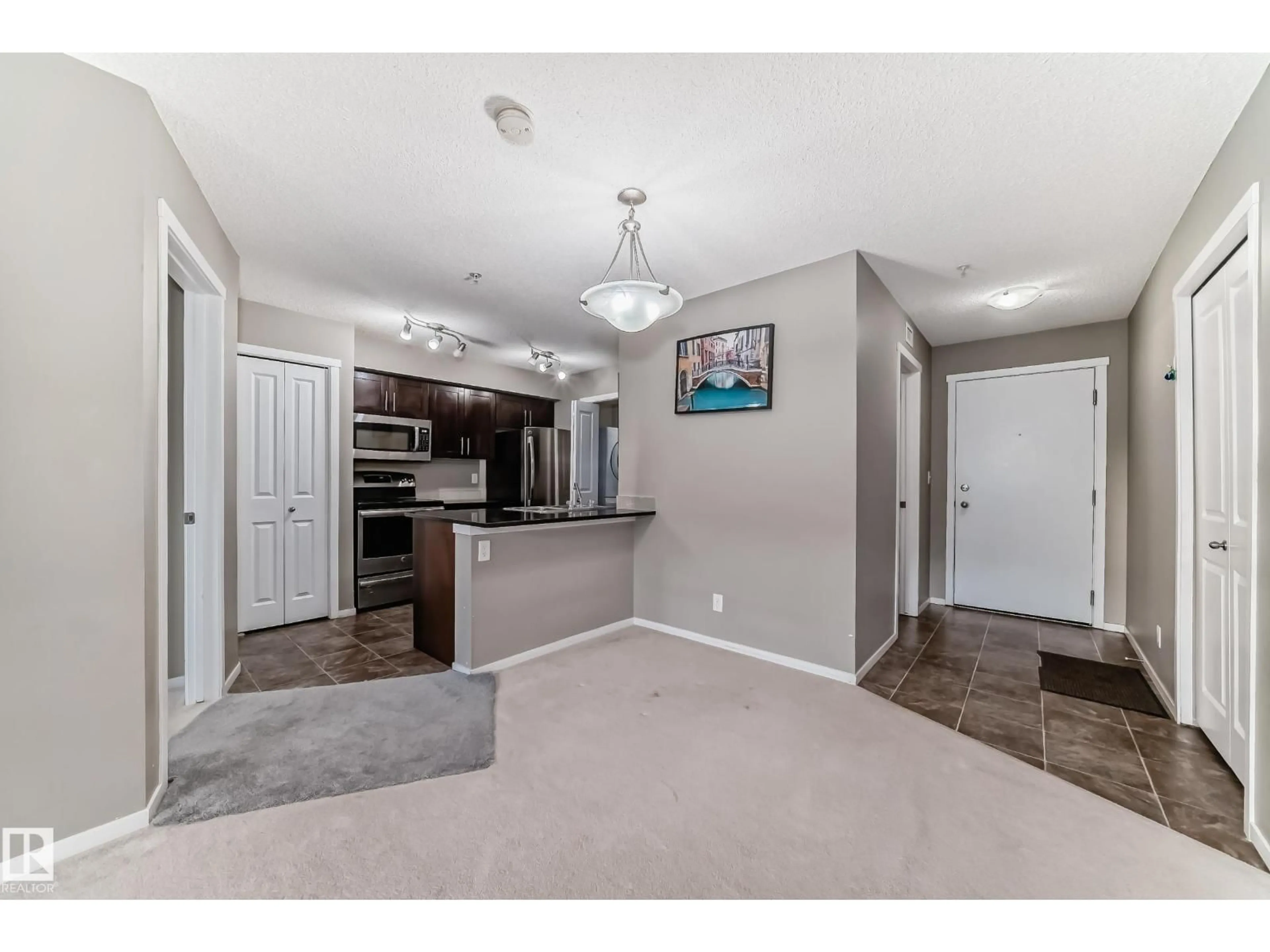 Open concept kitchen, unknown for 121 WATT CM, Edmonton Alberta T6X2C6