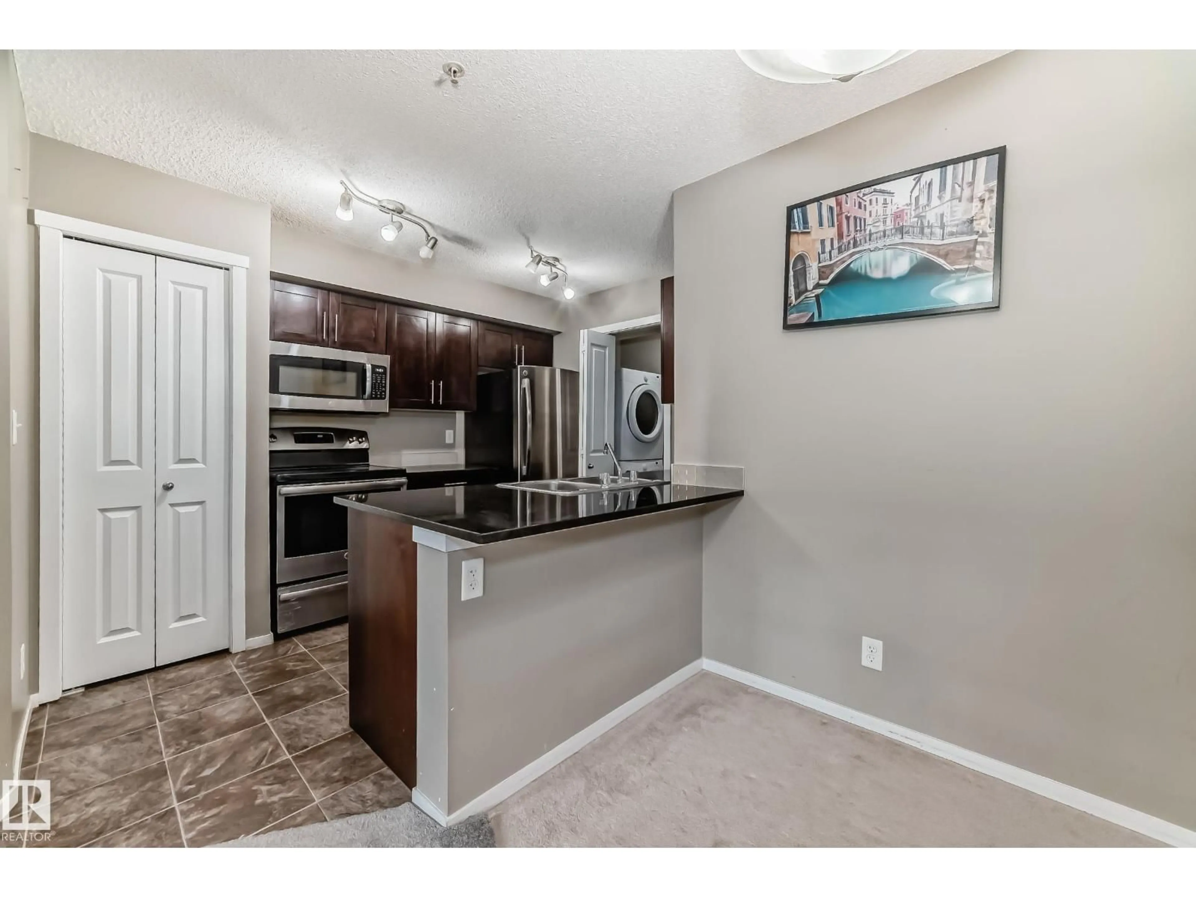 Open concept kitchen, unknown for 121 WATT CM, Edmonton Alberta T6X2C6