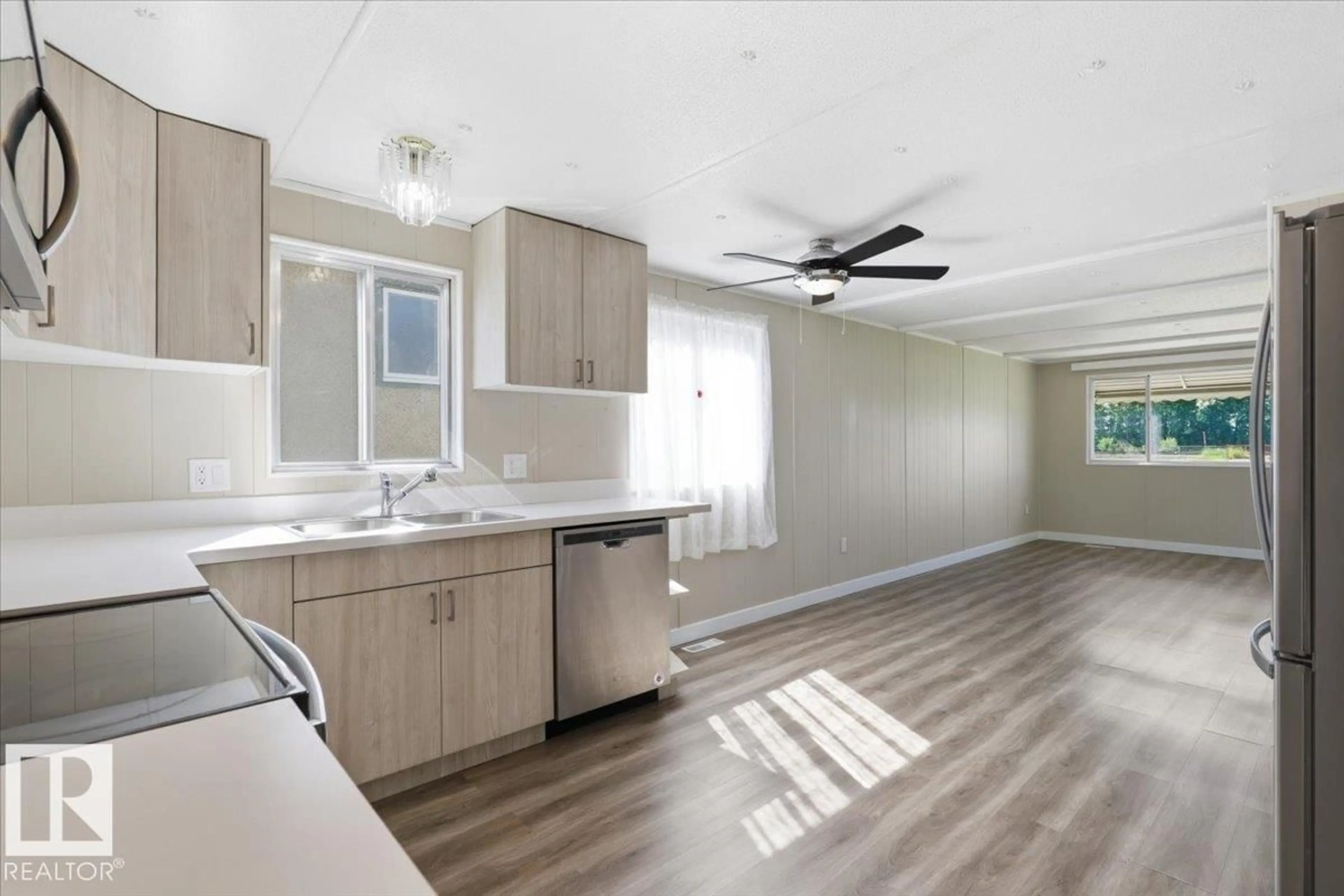 Open concept kitchen, wood/laminate floor for 5108 44 AVE, Calmar Alberta T0C0V0