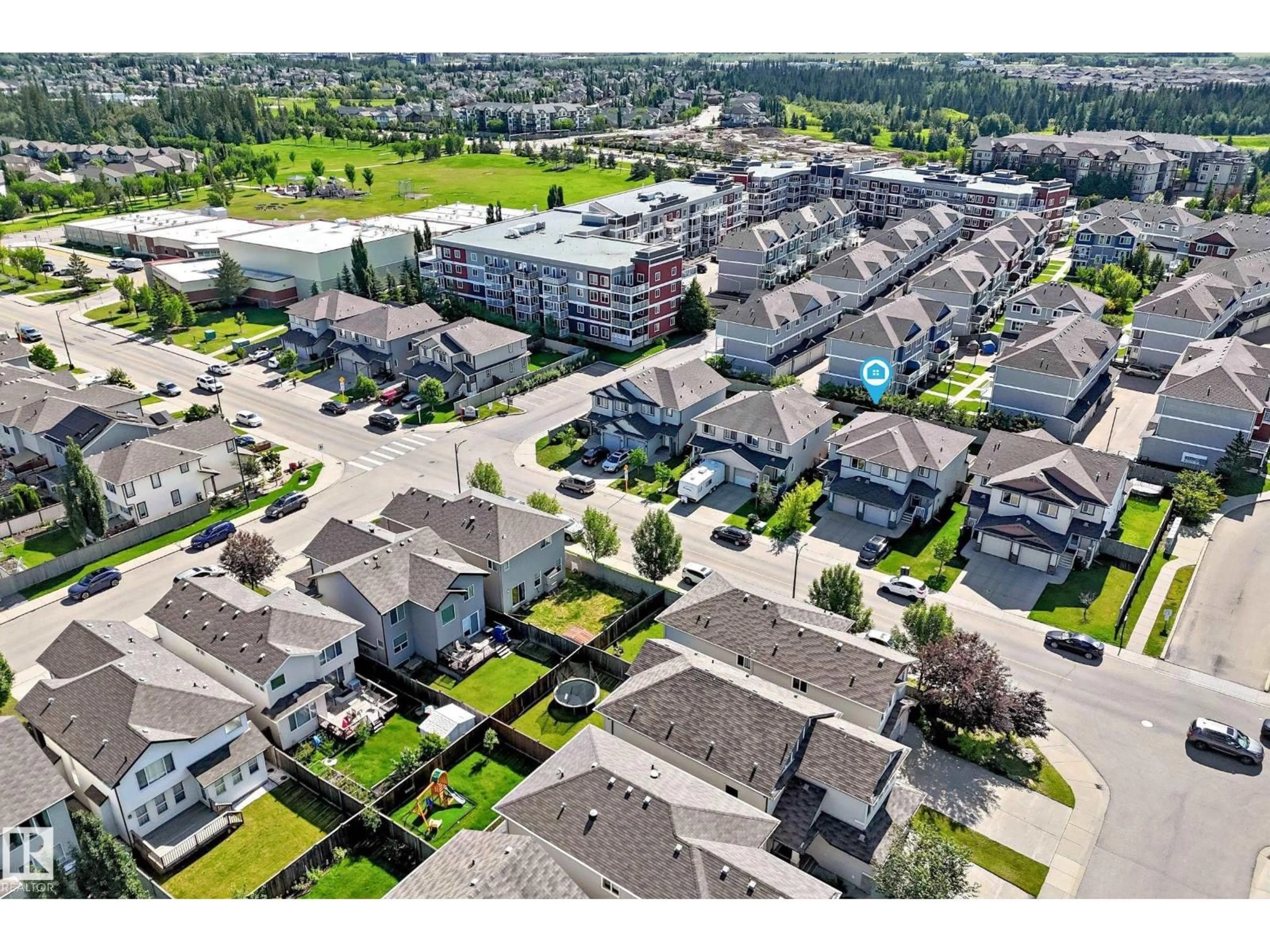 A pic from outside/outdoor area/front of a property/back of a property/a pic from drone, street for 1806 RUTHERFORD RD, Edmonton Alberta T6W2K6