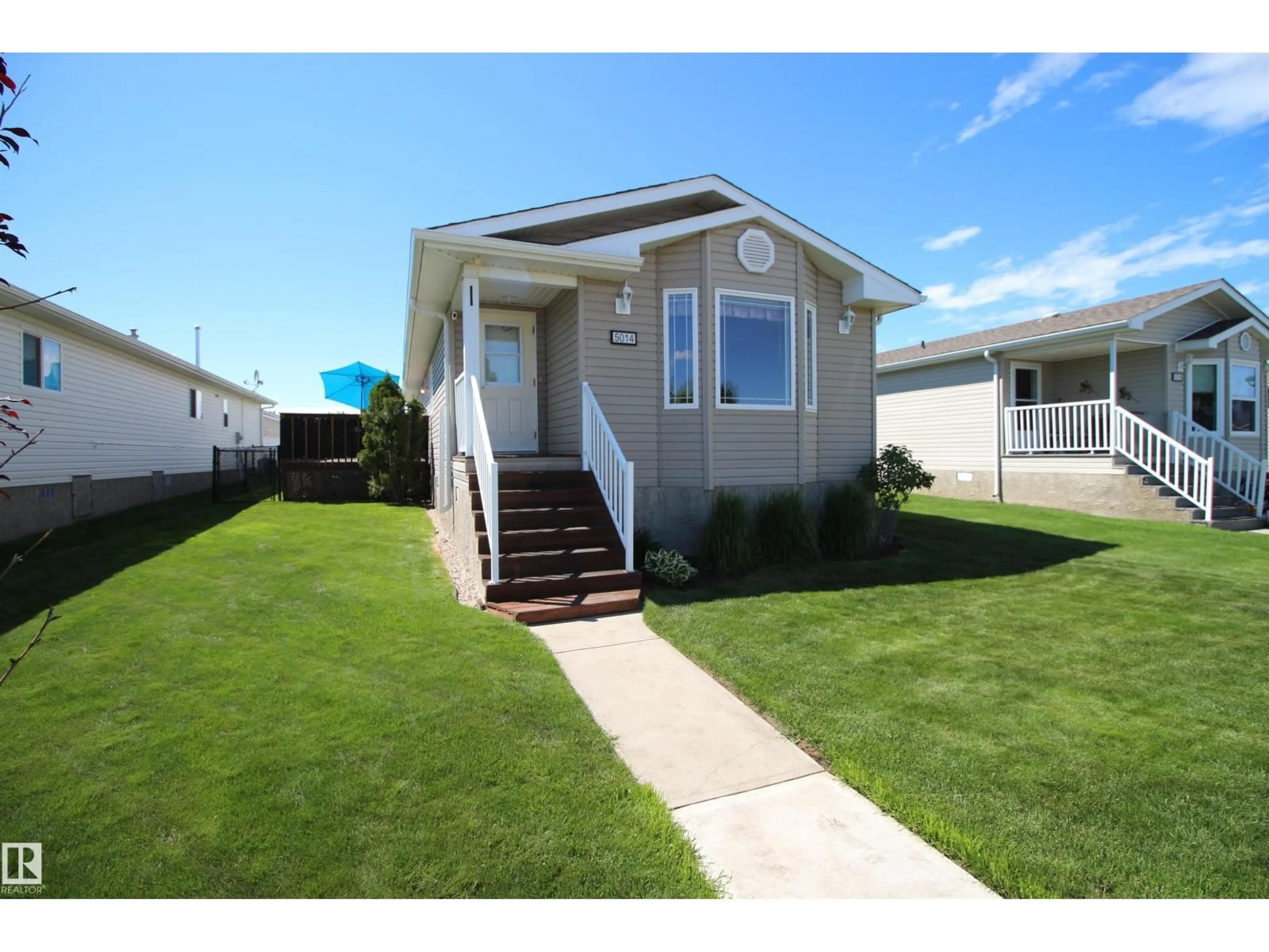 Home with vinyl exterior material, street for 5014 ASPEN PLACE, Leduc Alberta T9E8R3