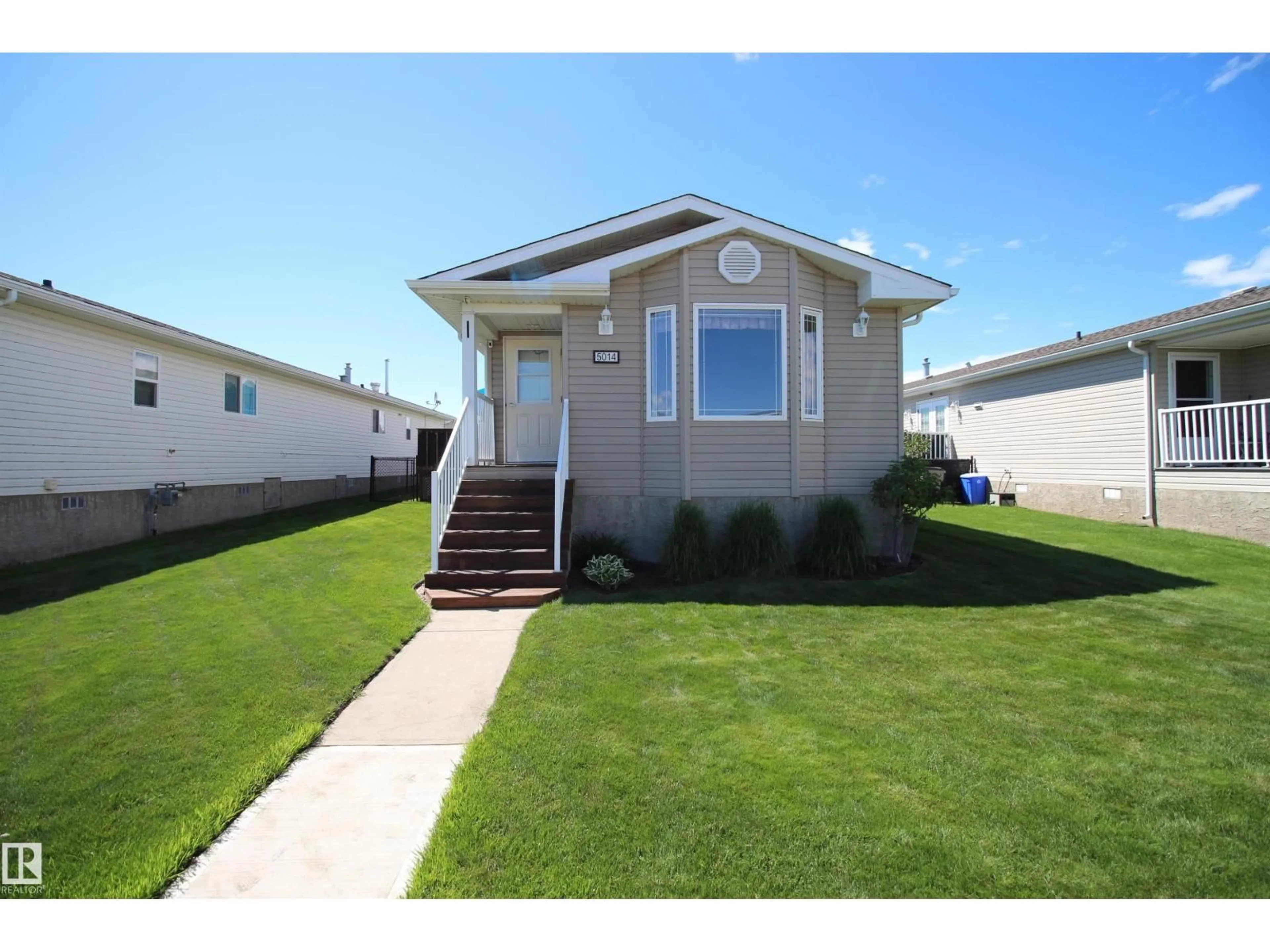 Home with vinyl exterior material, street for 5014 ASPEN PLACE, Leduc Alberta T9E8R3
