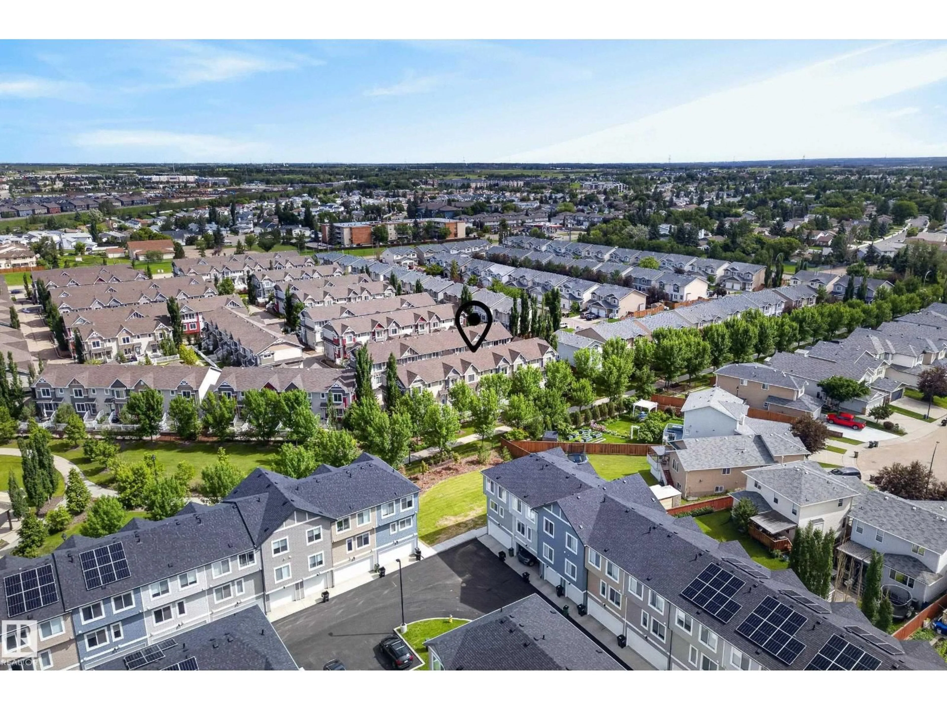 A pic from outside/outdoor area/front of a property/back of a property/a pic from drone, unknown for 53 - 3625 144 AV, Edmonton Alberta T5Y0T3