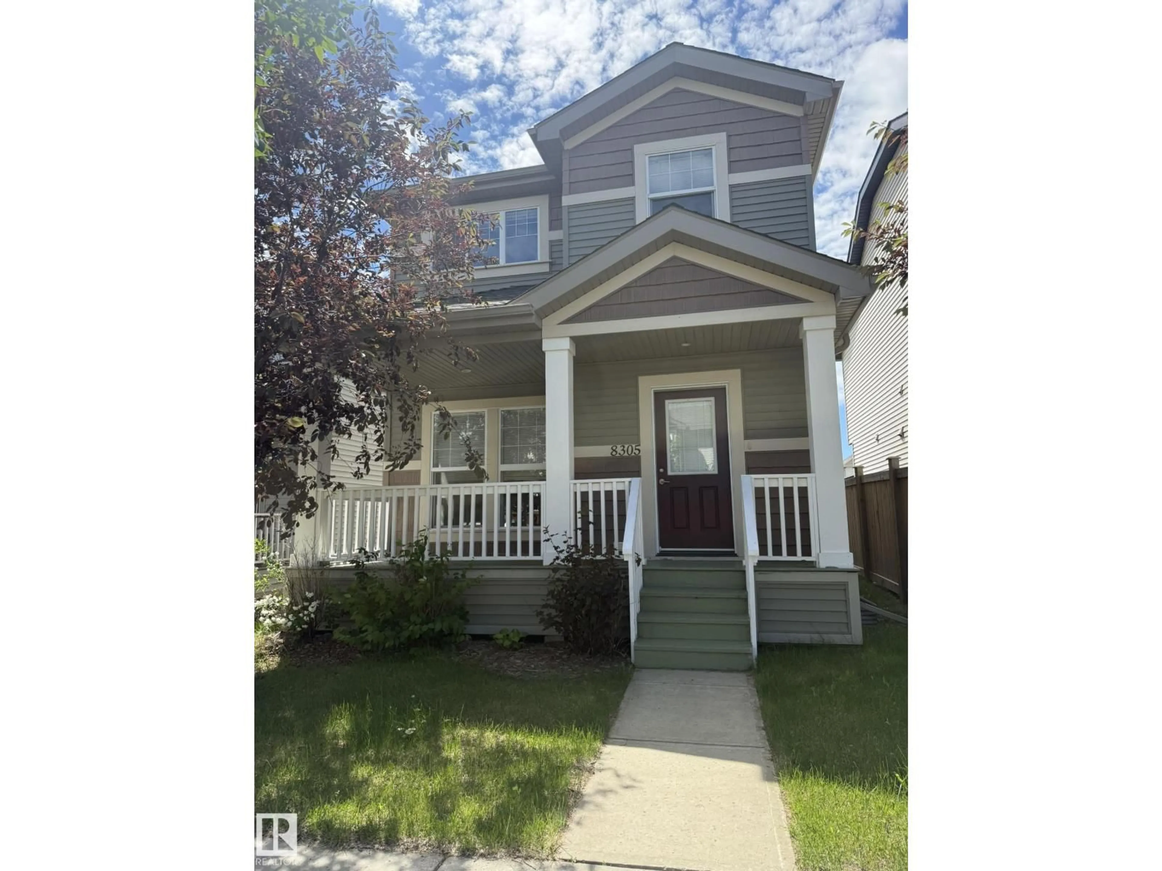 Home with vinyl exterior material, street for NW - 8305 ELLIS CR, Edmonton Alberta T6M2N5