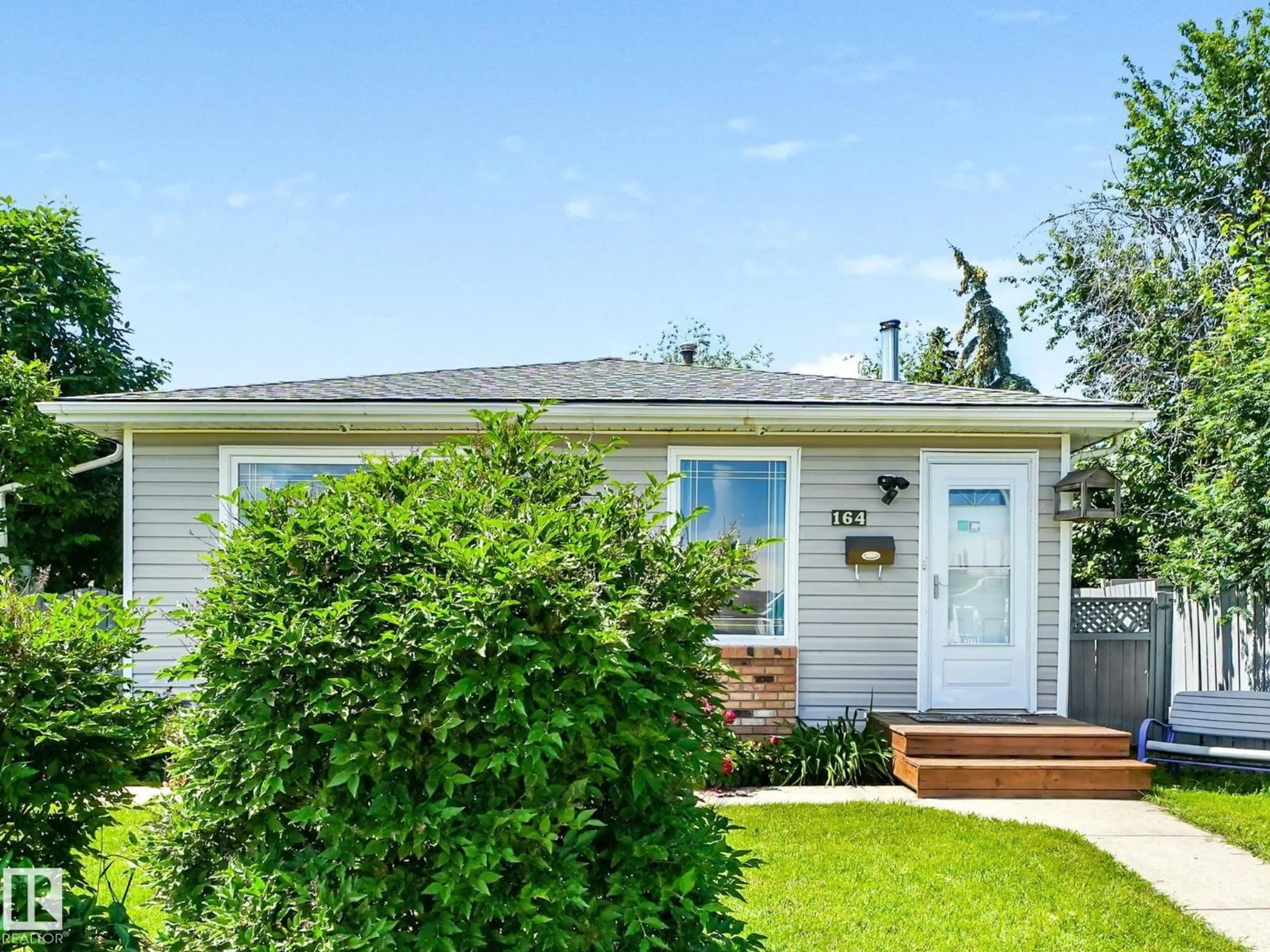 Home with vinyl exterior material, street for 164 WARWICK RD, Edmonton Alberta T5X4P8
