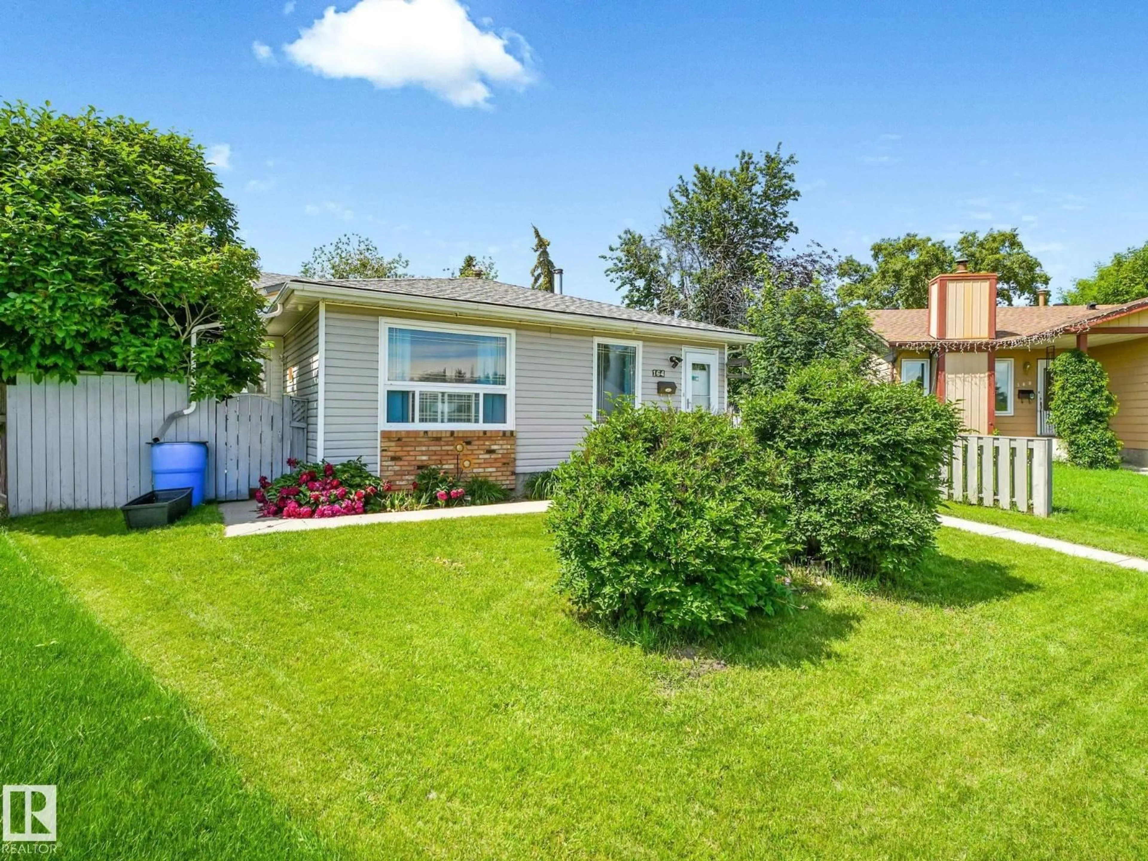 Home with vinyl exterior material, street for 164 WARWICK RD, Edmonton Alberta T5X4P8