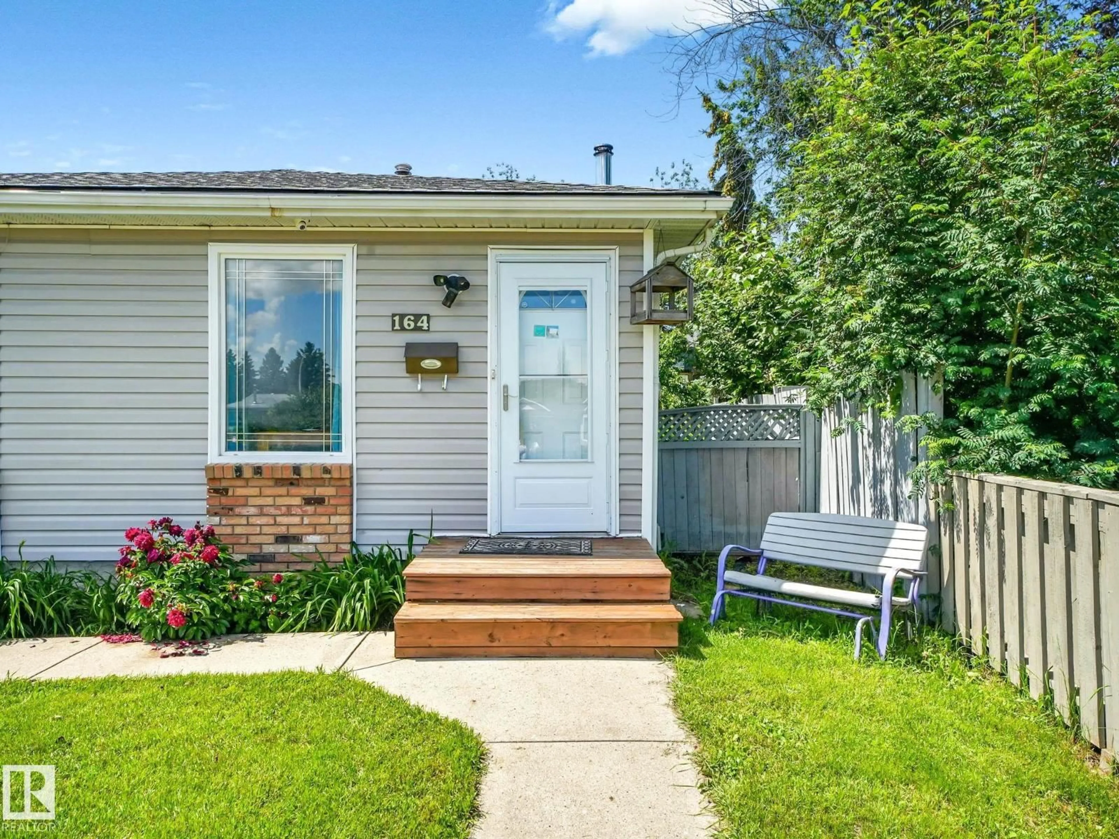 Home with vinyl exterior material, street for 164 WARWICK RD, Edmonton Alberta T5X4P8