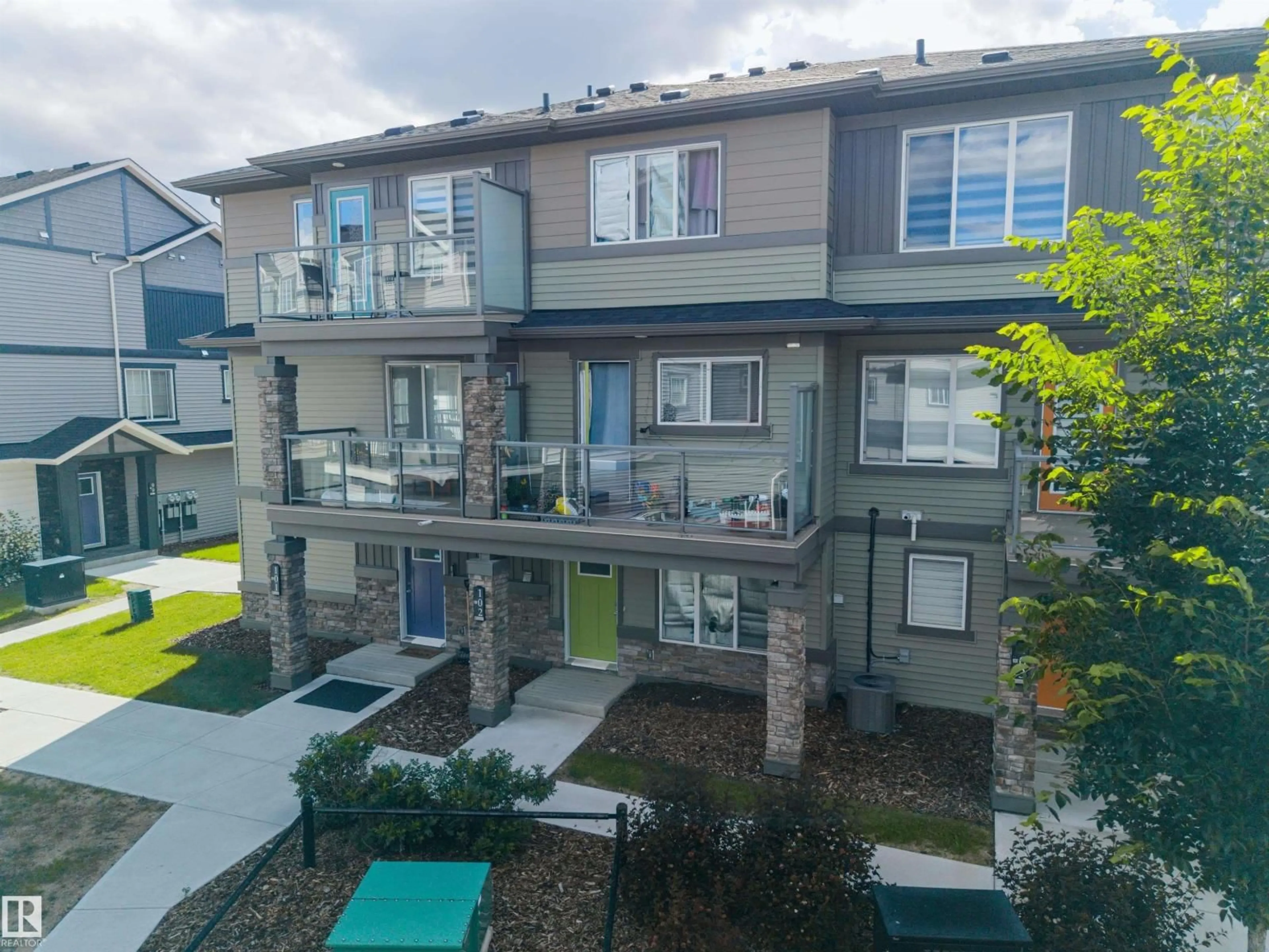A pic from outside/outdoor area/front of a property/back of a property/a pic from drone, unknown for #102 - 1530 TAMARACK BV, Edmonton Alberta T6T2E6