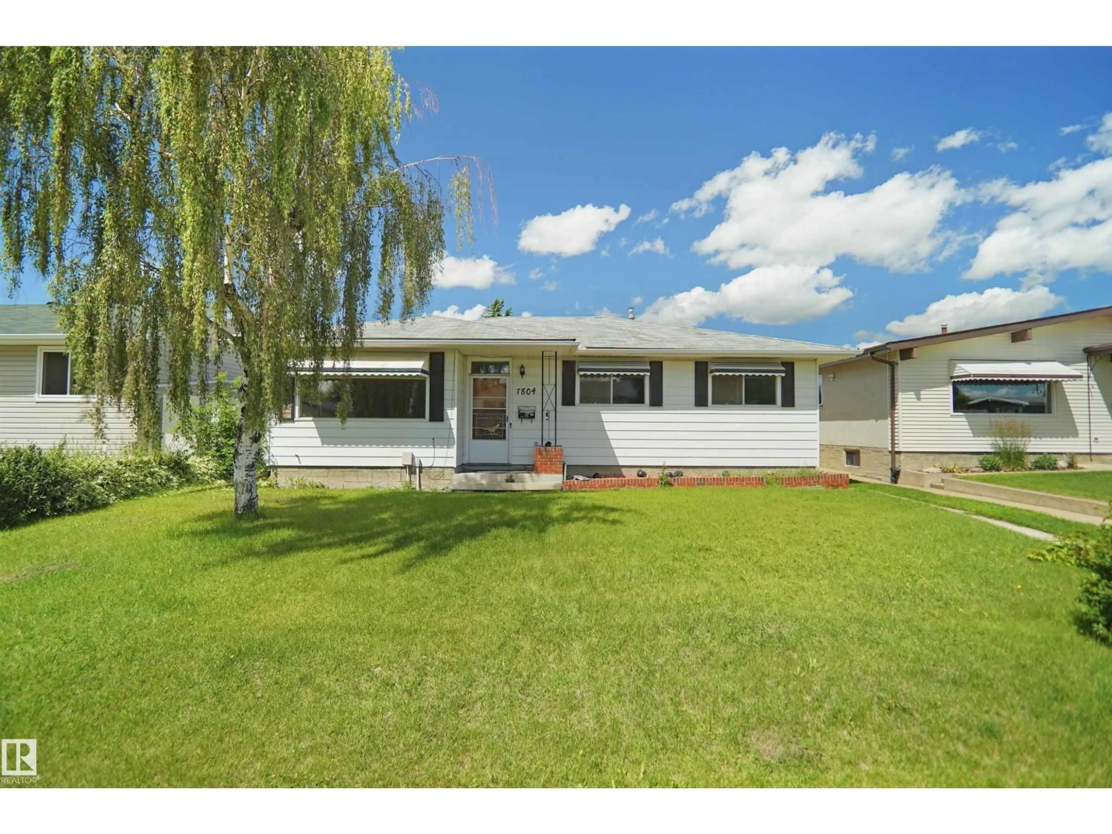 A pic from outside/outdoor area/front of a property/back of a property/a pic from drone, street for 7804 143 AV, Edmonton Alberta T5C2R1