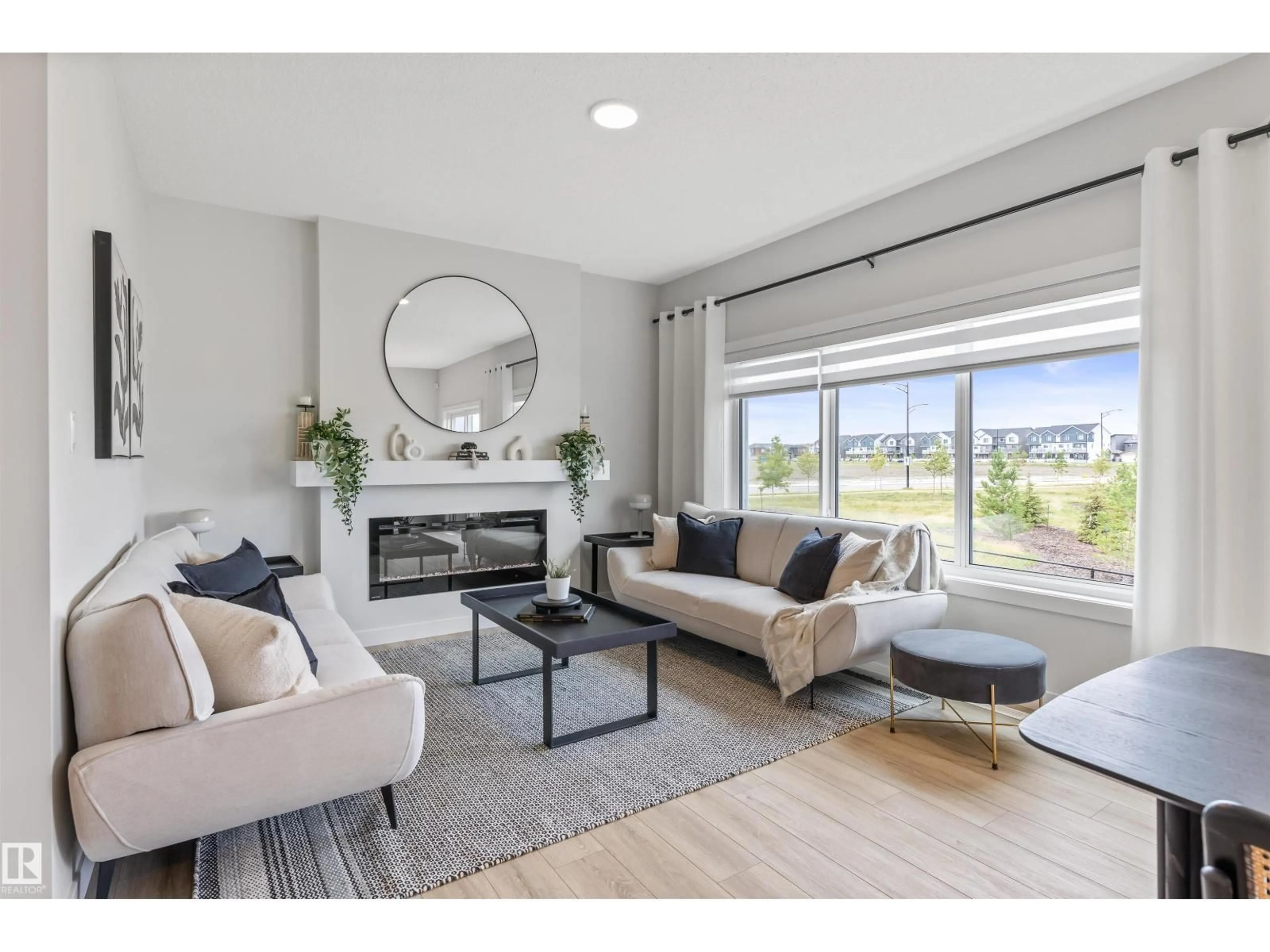 Living room with furniture, unknown for 784 BANK DR, Leduc Alberta T9E1G2