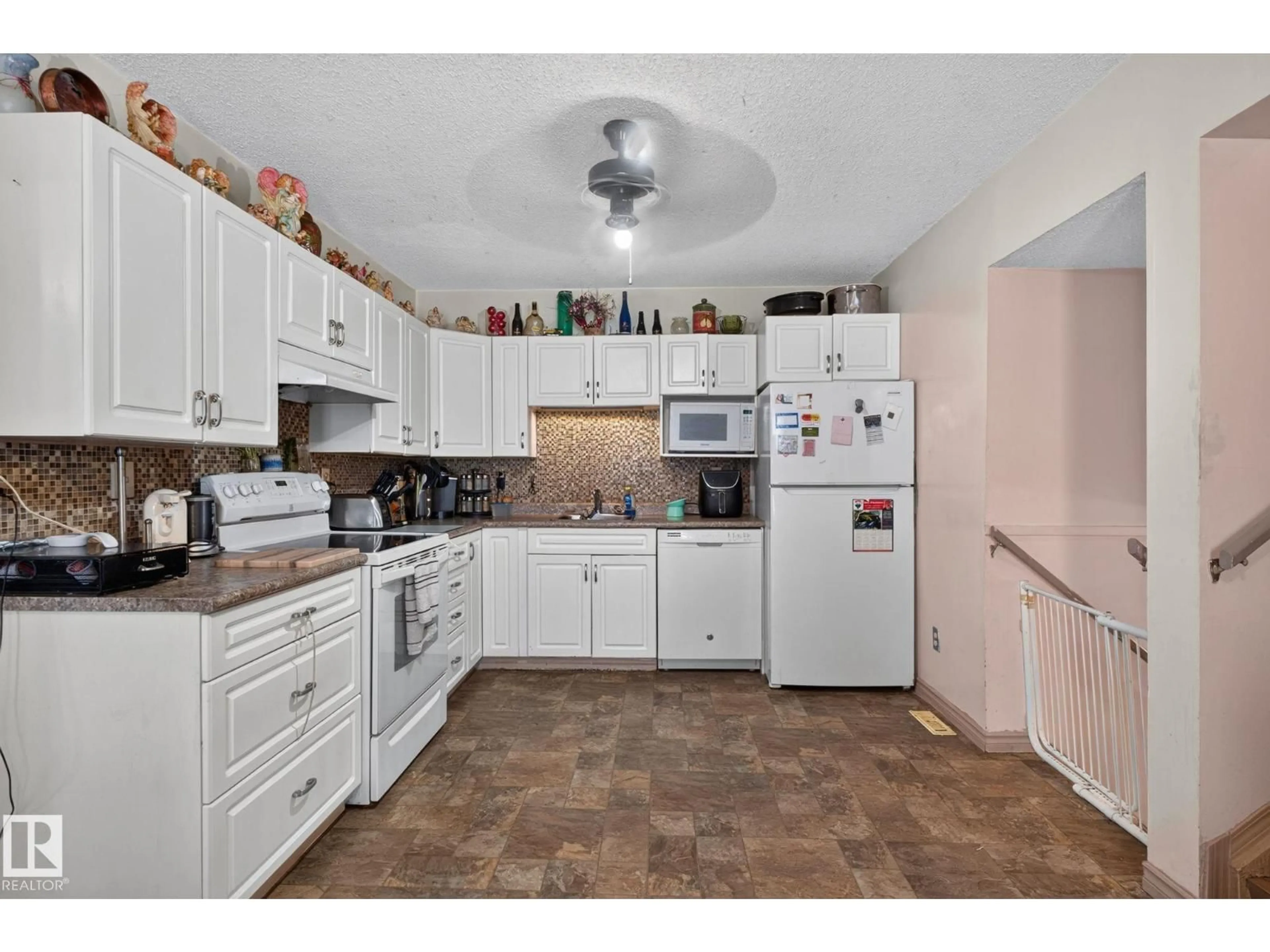 Standard kitchen, ceramic/tile floor for 8316 157 AV, Edmonton Alberta T5Z2P7