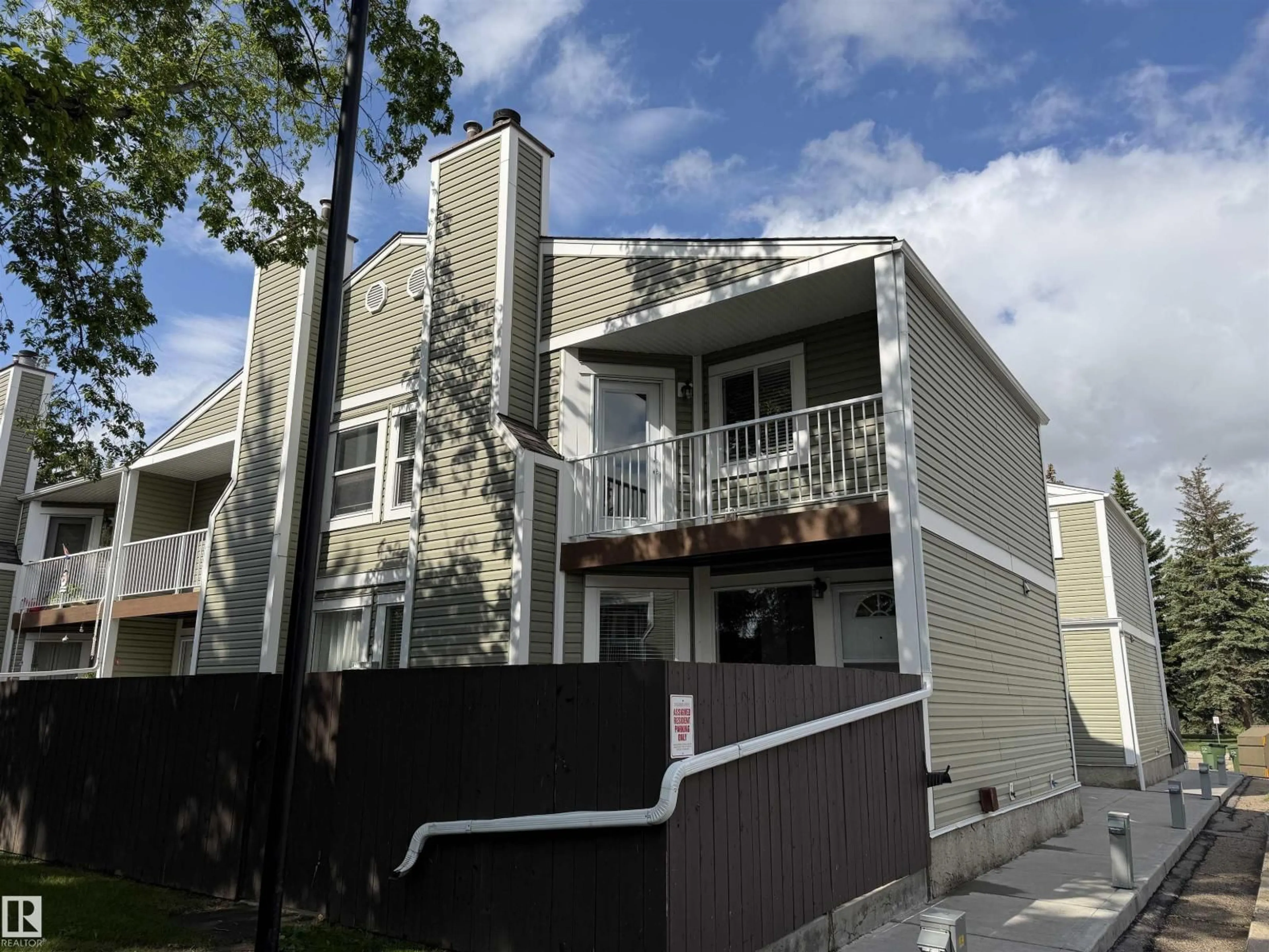 Home with vinyl exterior material, street for #1 - 1820 56 ST, Edmonton Alberta T6L5L4