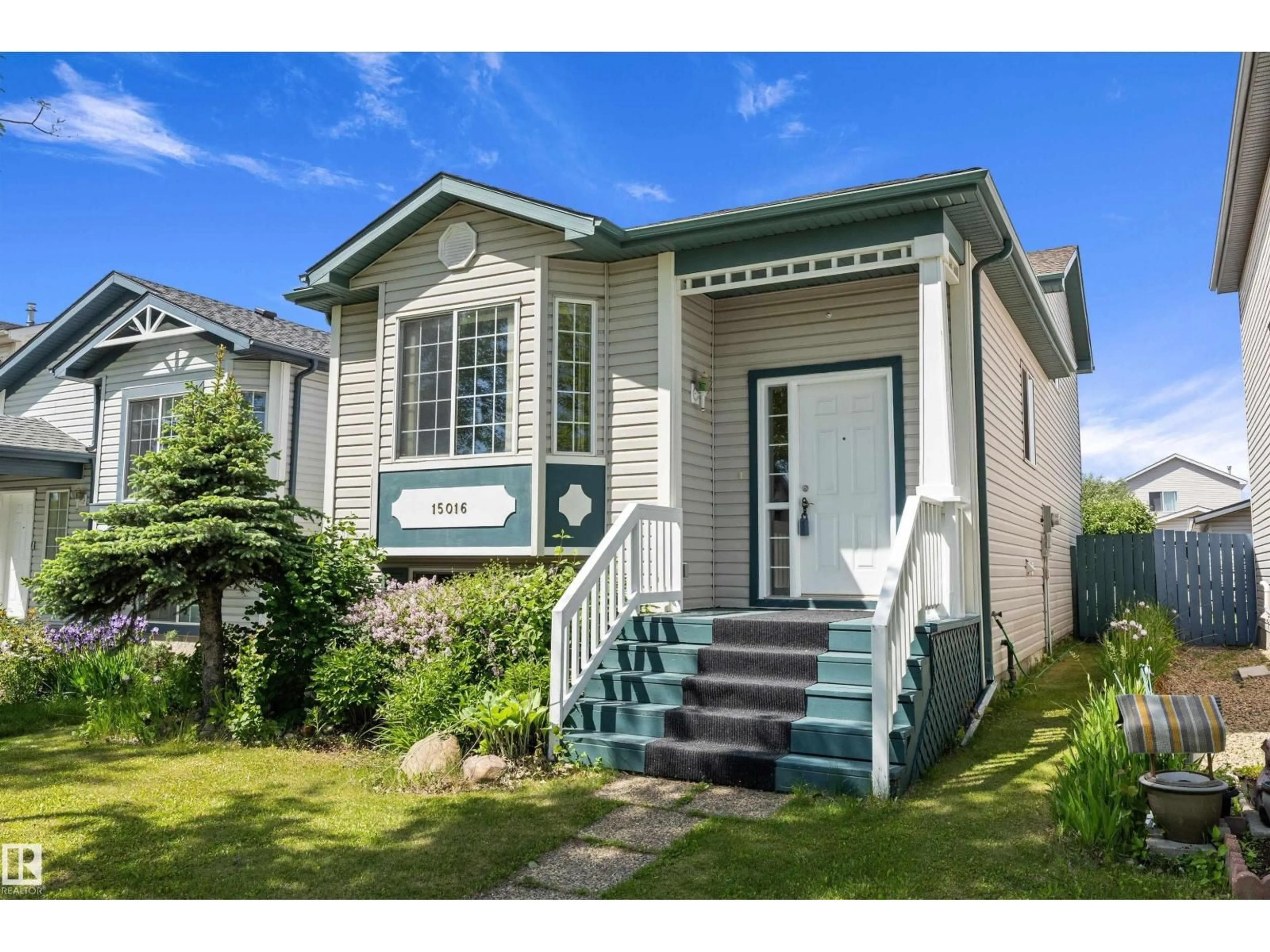 Home with vinyl exterior material, street for NW - 15016 134 ST, Edmonton Alberta T6V1M6