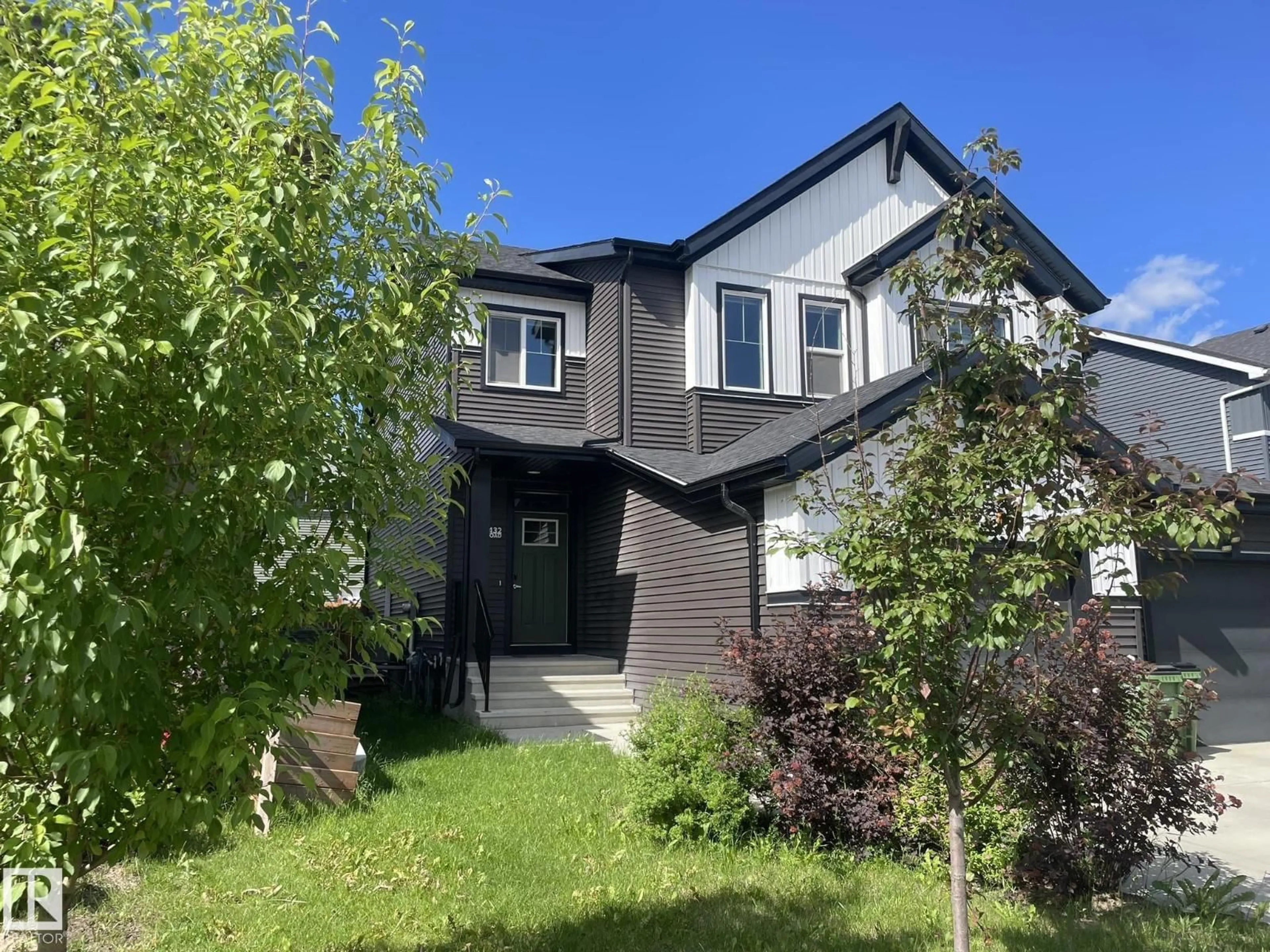 Home with vinyl exterior material, street for 7432 ELMER RD, Edmonton Alberta T5T4G2