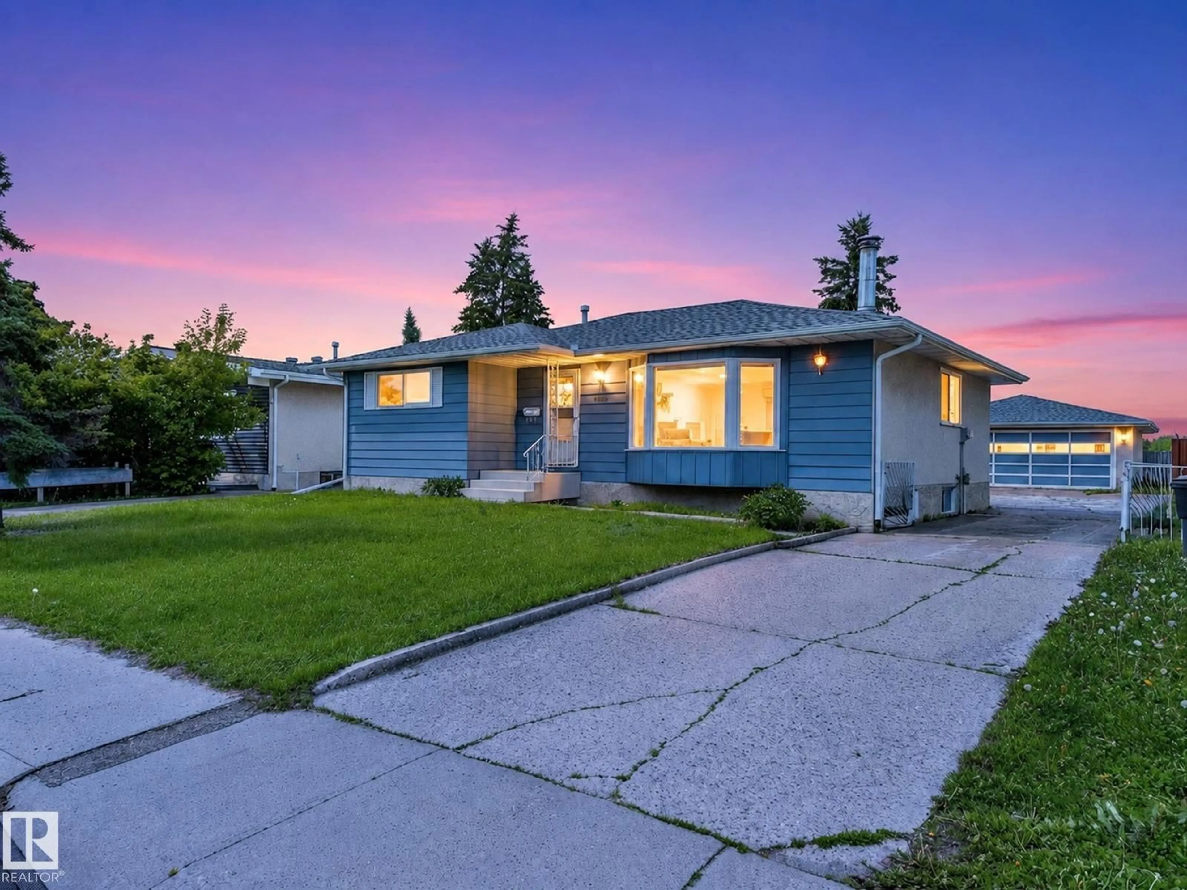 A pic from outside/outdoor area/front of a property/back of a property/a pic from drone, street for 11616 158 AV, Edmonton Alberta T5X2K4