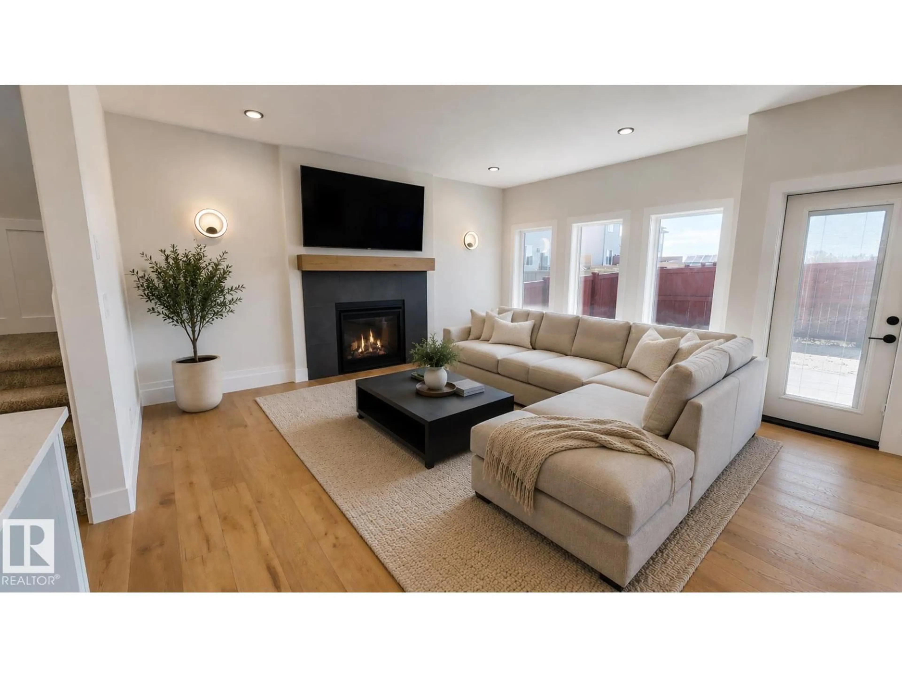 Living room with furniture, wood/laminate floor for 51 GRASSVIEW CR, Spruce Grove Alberta T7X3G1
