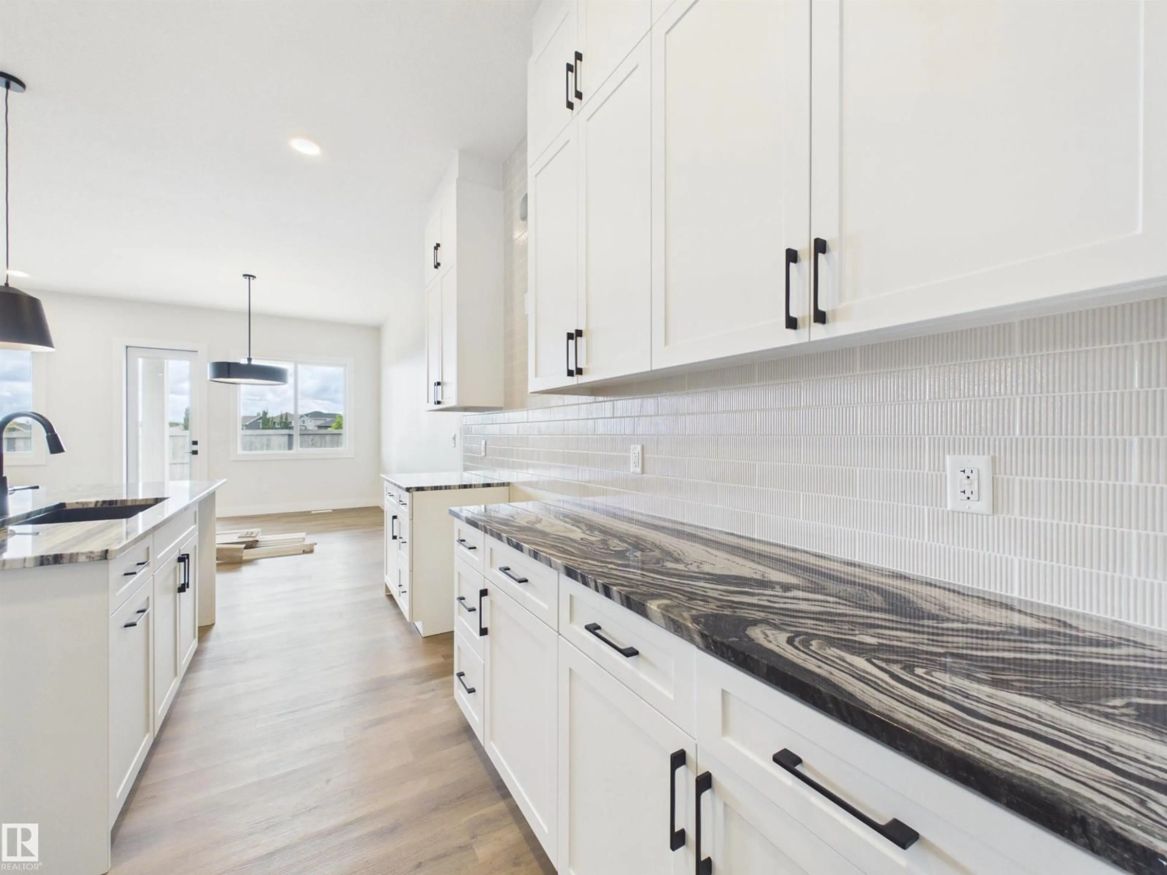Open concept kitchen, ceramic/tile floor for 593 GENESIS WD, Stony Plain Alberta T7Z0G6