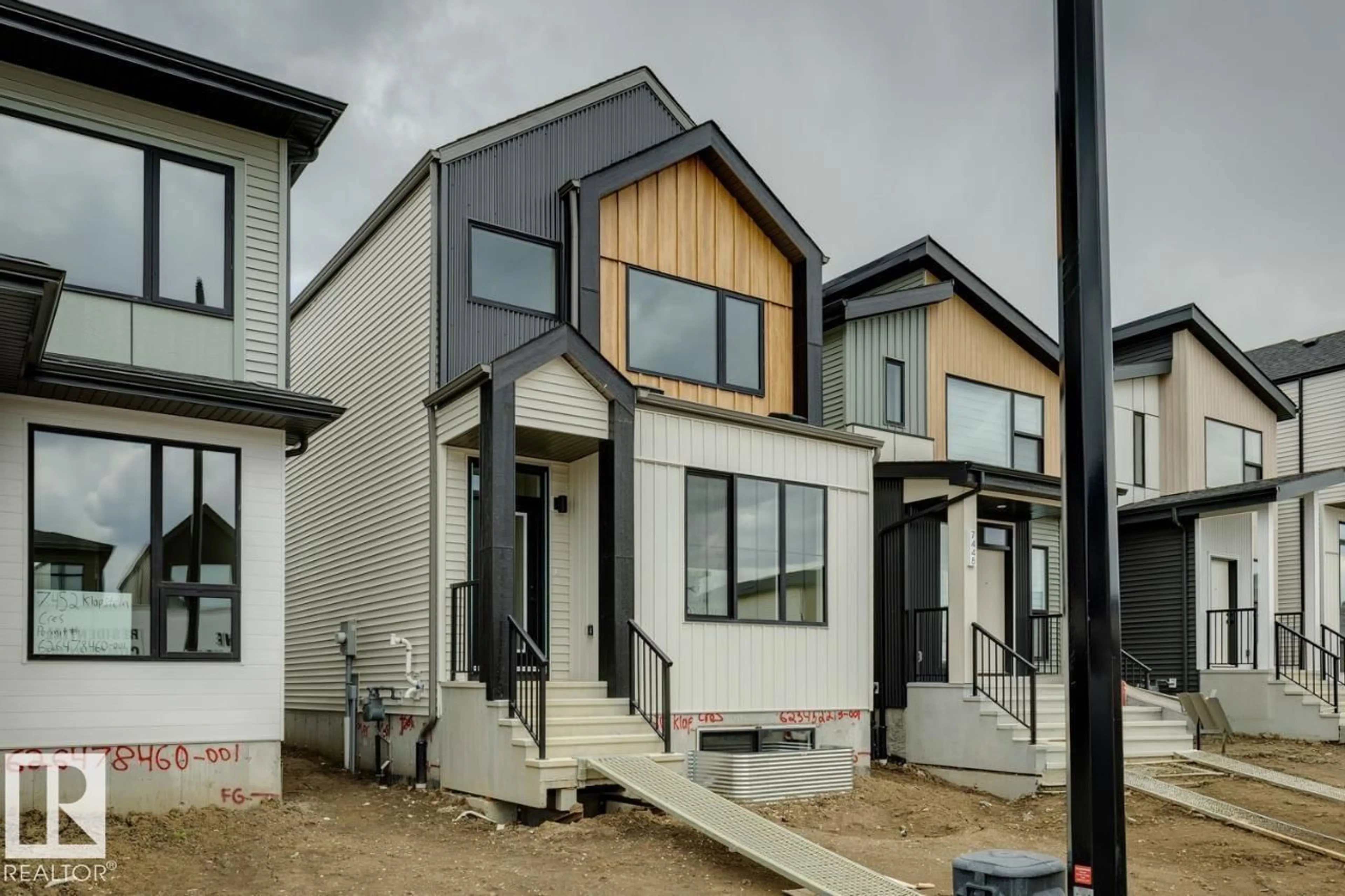 Home with vinyl exterior material, street for 7450 KLAPSTEIN CR, Edmonton Alberta T6W5N8