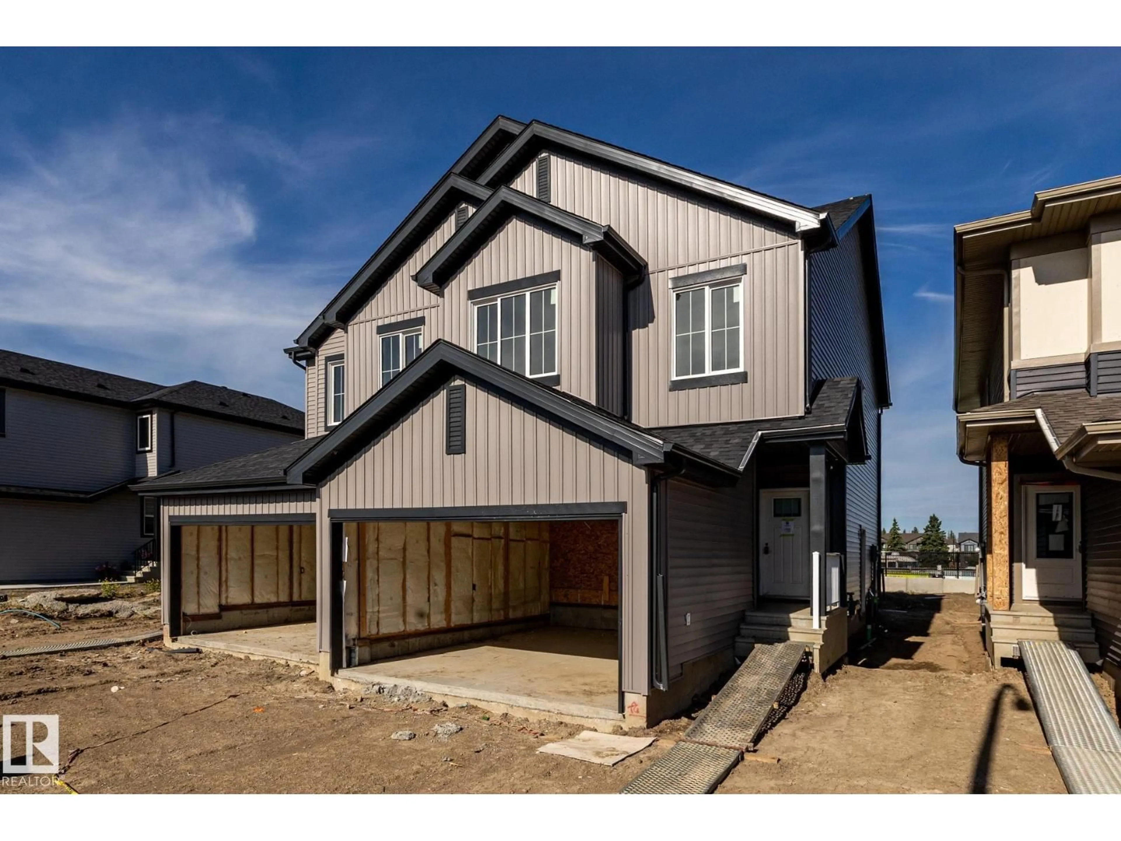 Home with vinyl exterior material, street for 13 PATRIOT WY, Spruce Grove Alberta T7X2W6