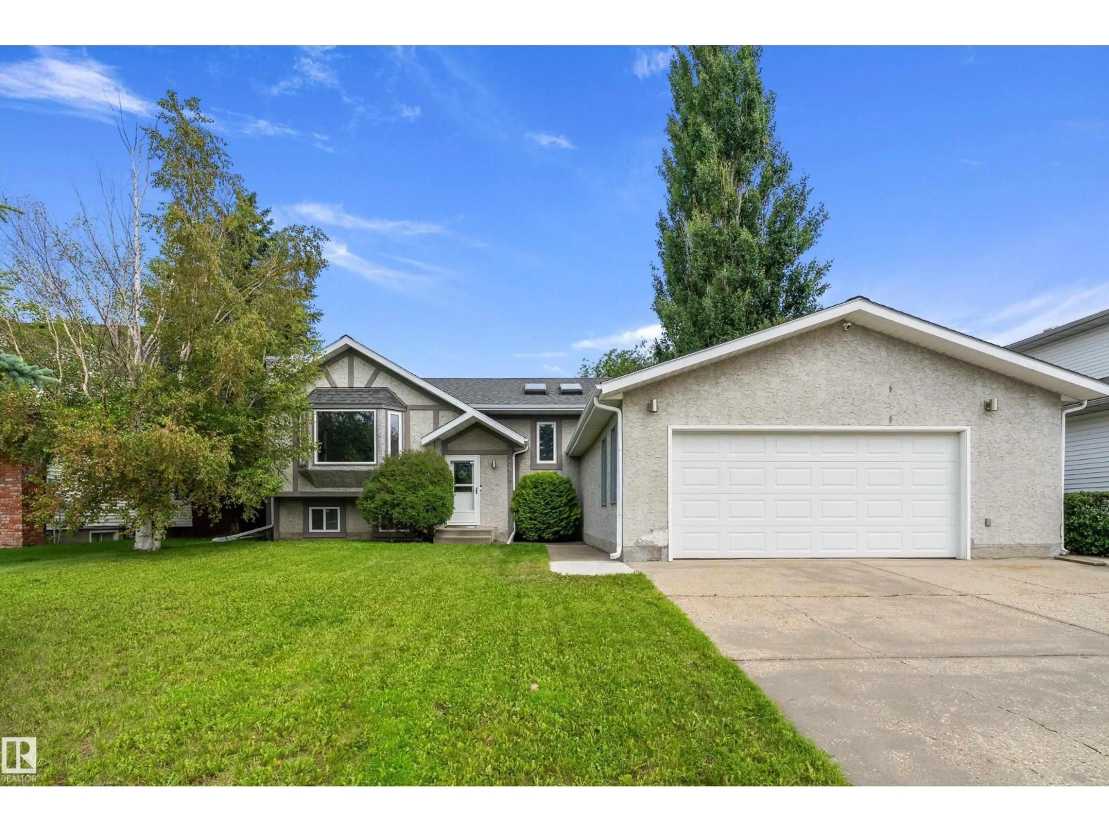 Home with vinyl exterior material, street for 5609 58 ST, Beaumont Alberta T4X1A9