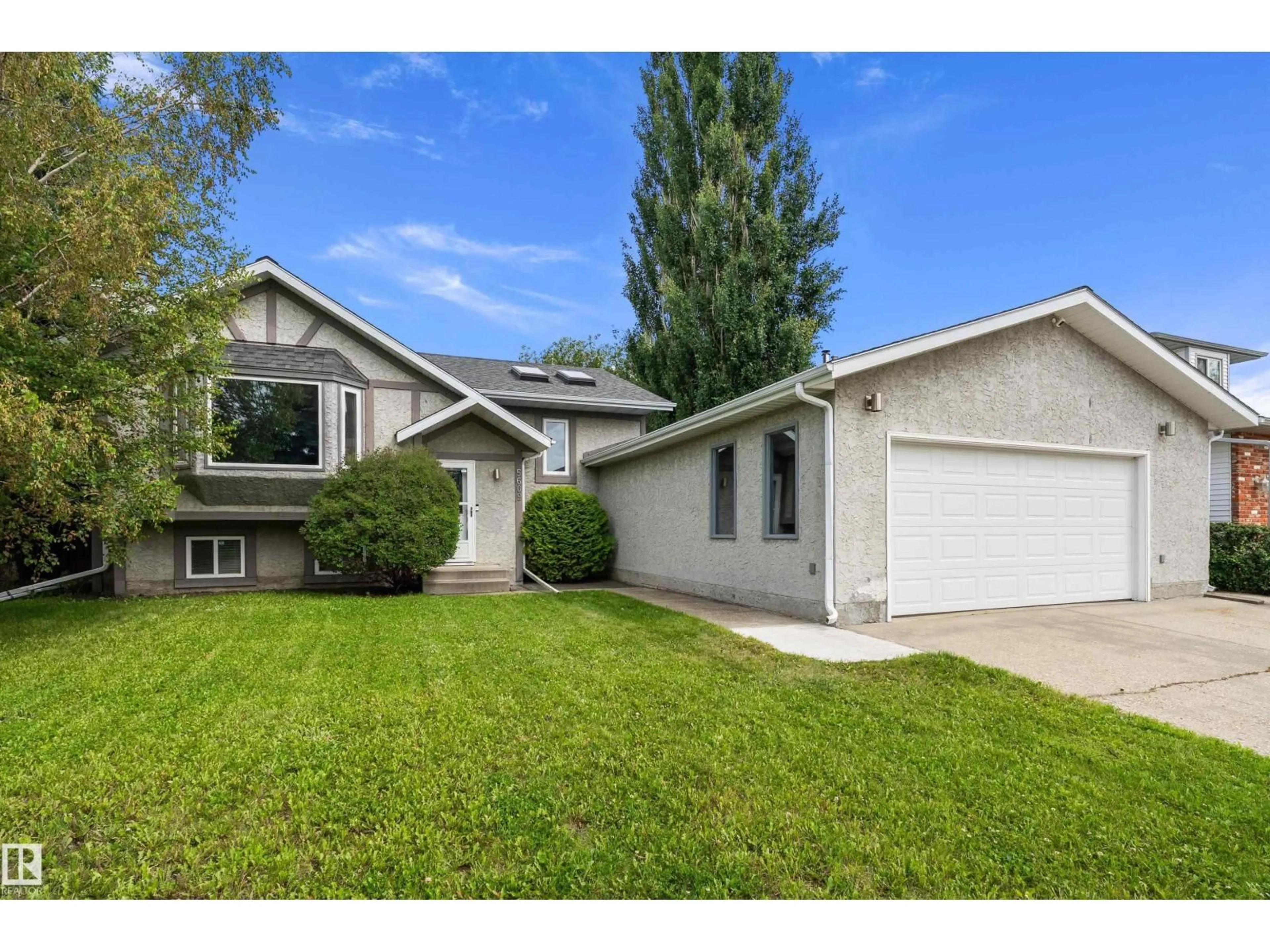 Home with vinyl exterior material, street for 5609 58 ST, Beaumont Alberta T4X1A9