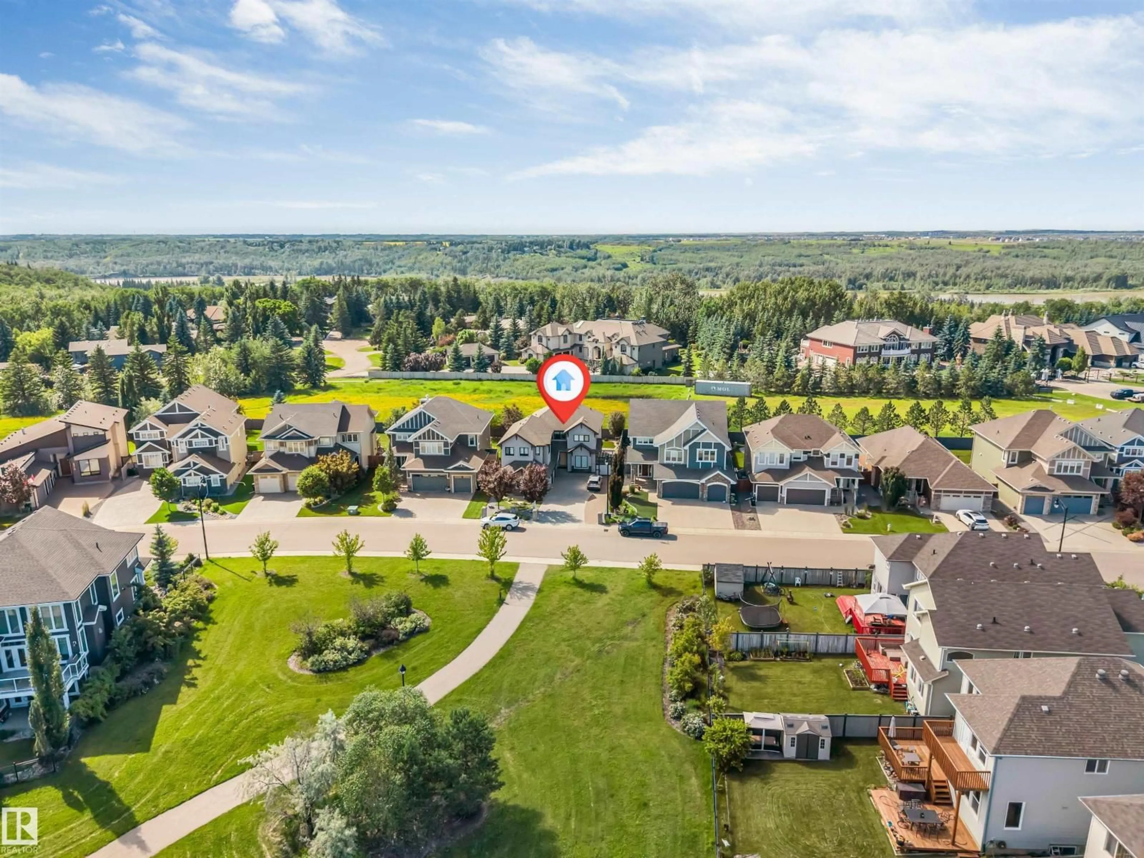 A pic from outside/outdoor area/front of a property/back of a property/a pic from drone, unknown for SW SW - 656 180 ST, Edmonton Alberta T6W2T1