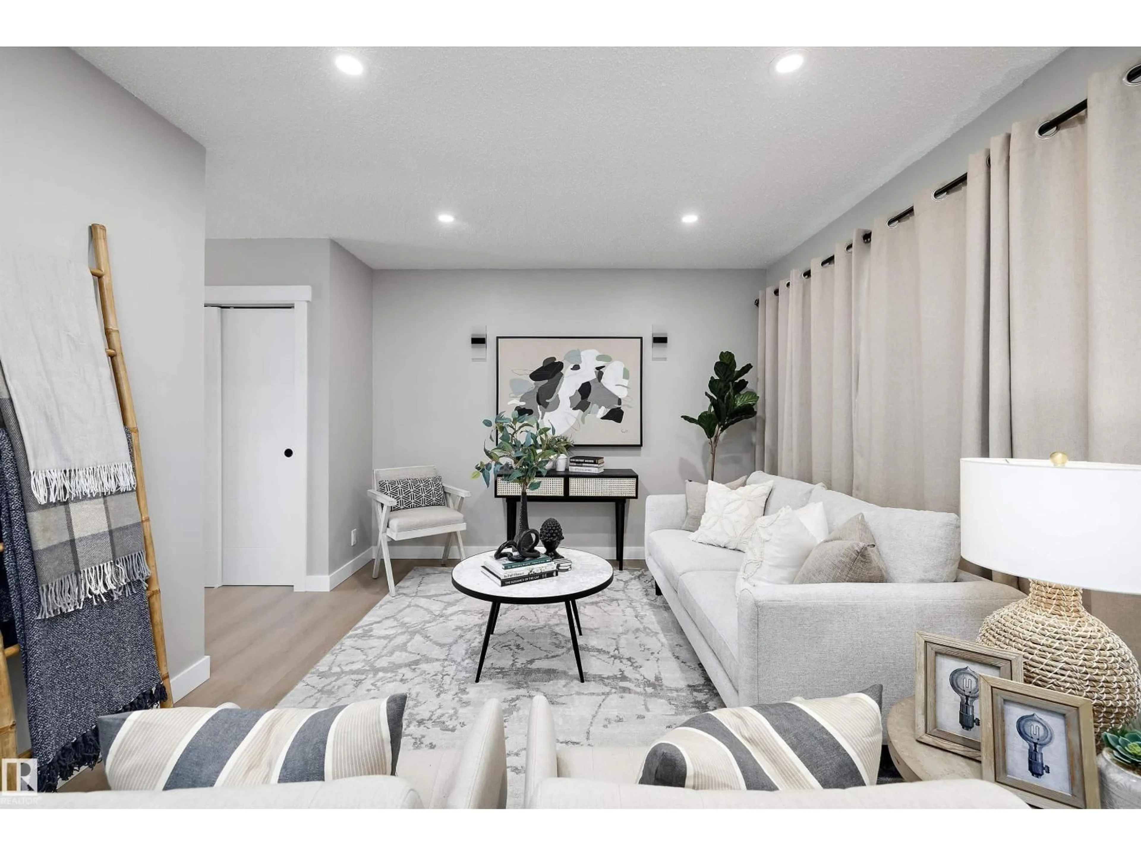 Living room with furniture, unknown for NW - 12912 103 ST, Edmonton Alberta T5E4M3