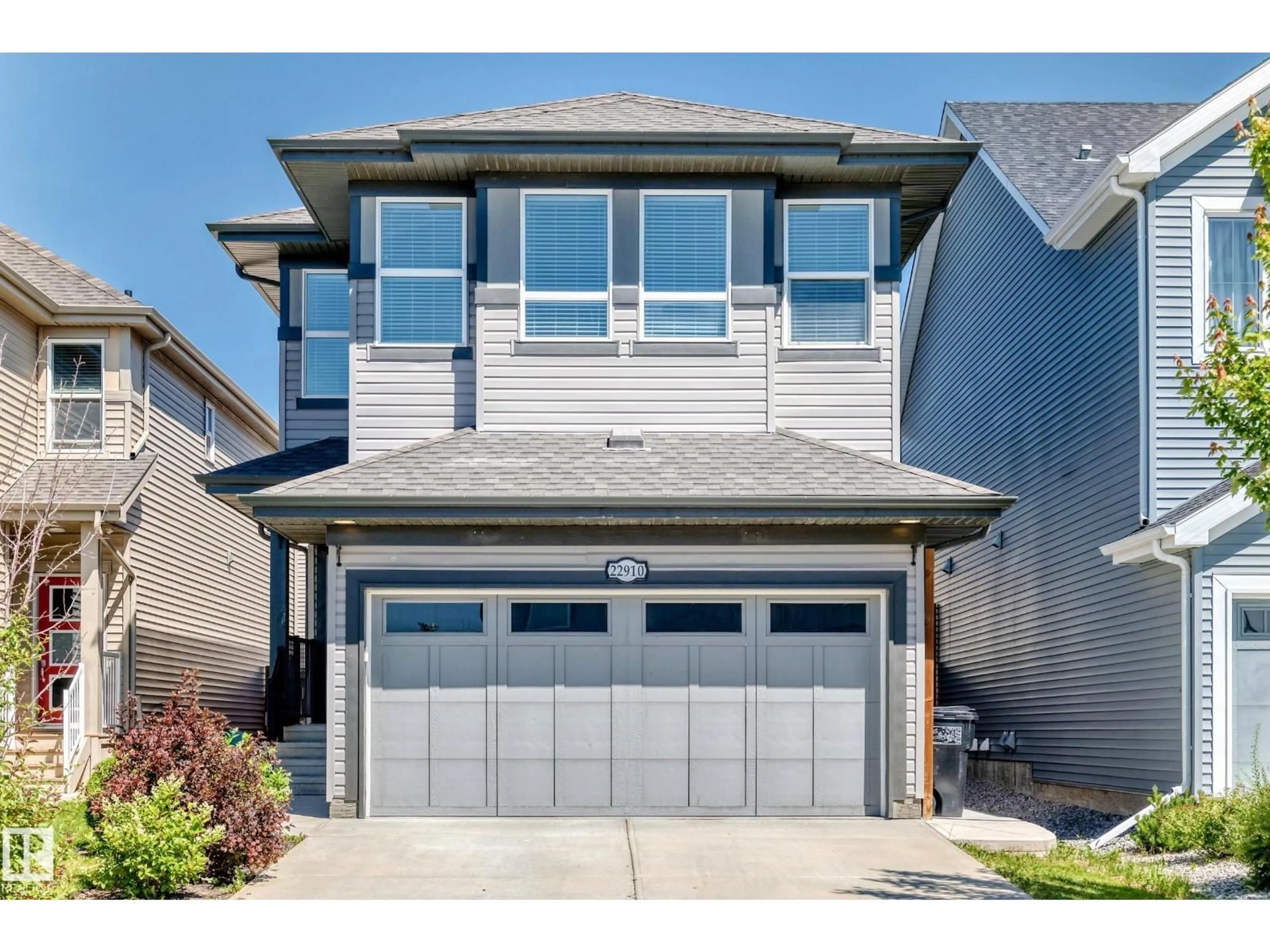 Home with vinyl exterior material, street for 22910 96A AV, Edmonton Alberta T5T7M7