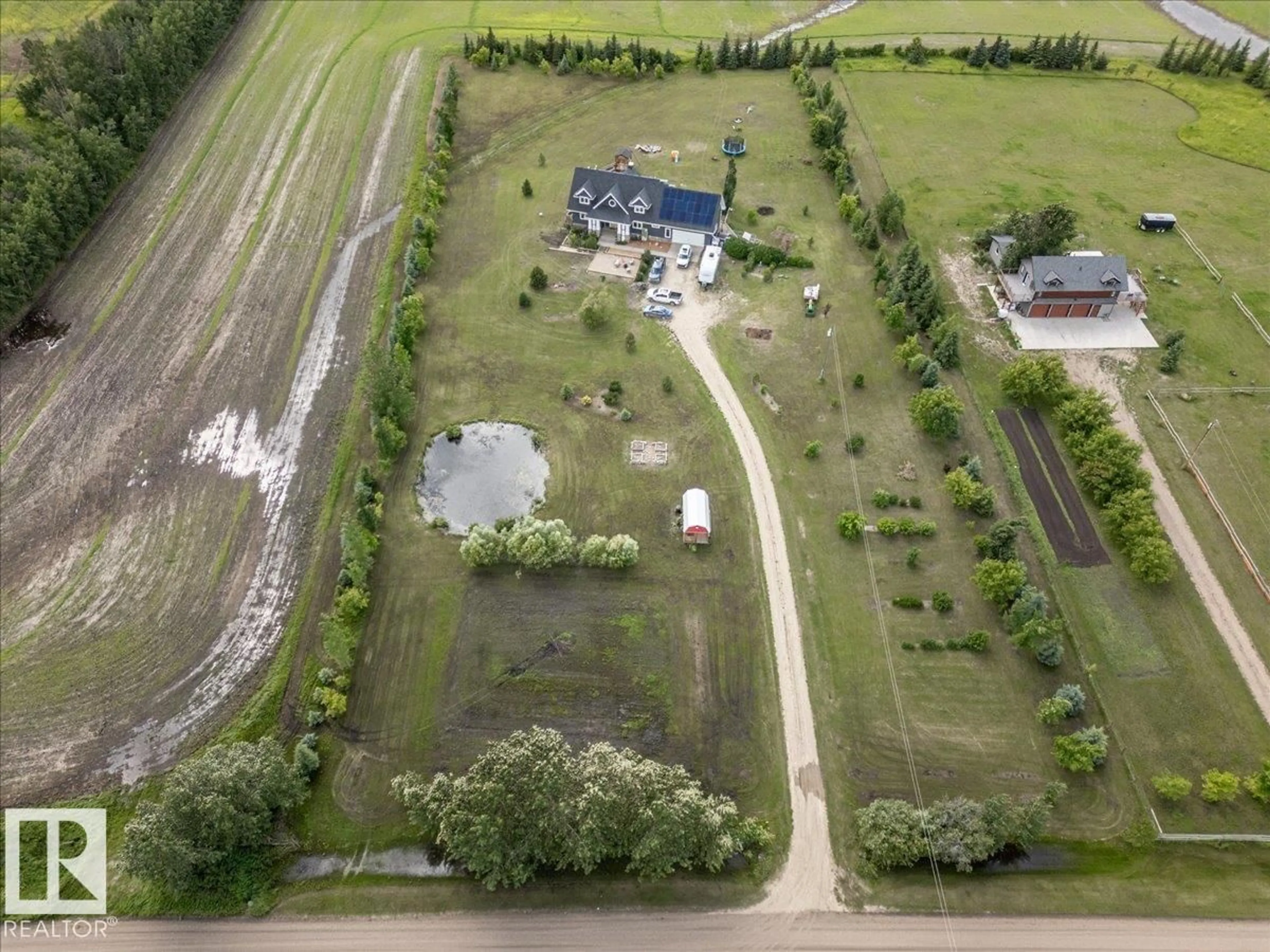 A pic from outside/outdoor area/front of a property/back of a property/a pic from drone, building for 50346 RGE RD 275, Rural Leduc County Alberta T0C0V0