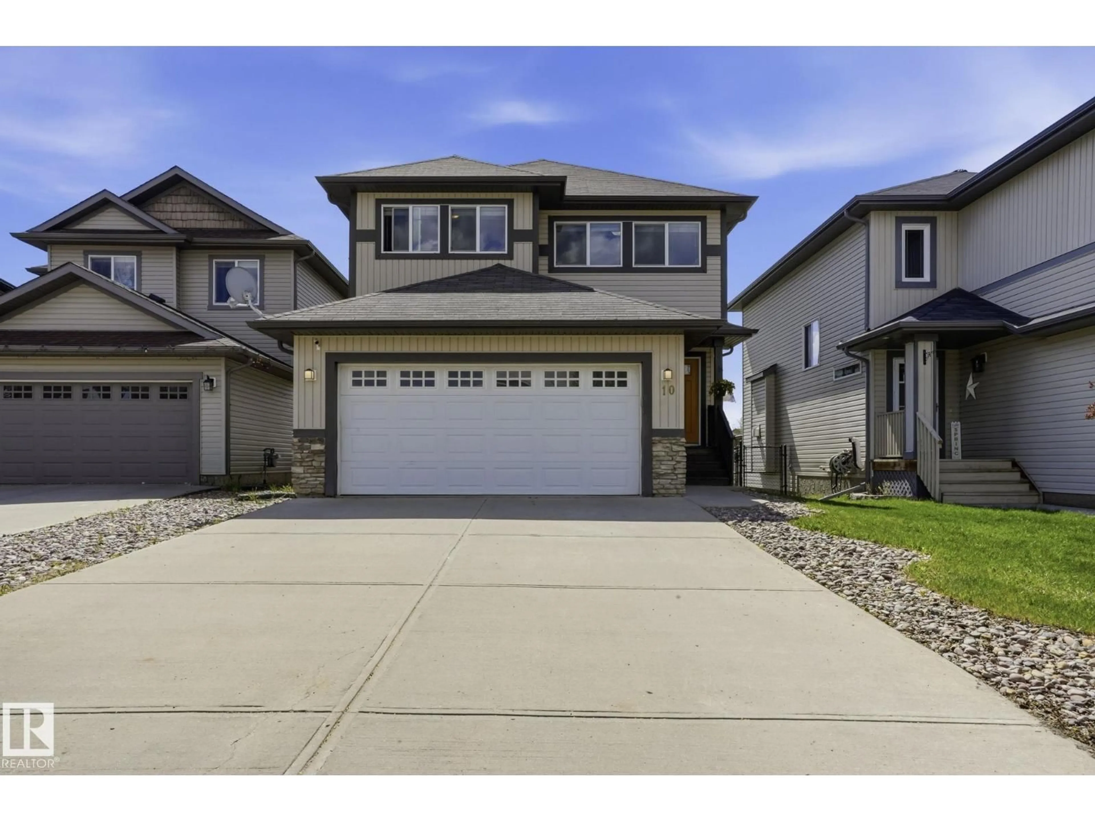 Home with vinyl exterior material, street for 10 ROCKWELL CL, Fort Saskatchewan Alberta T8L0E7