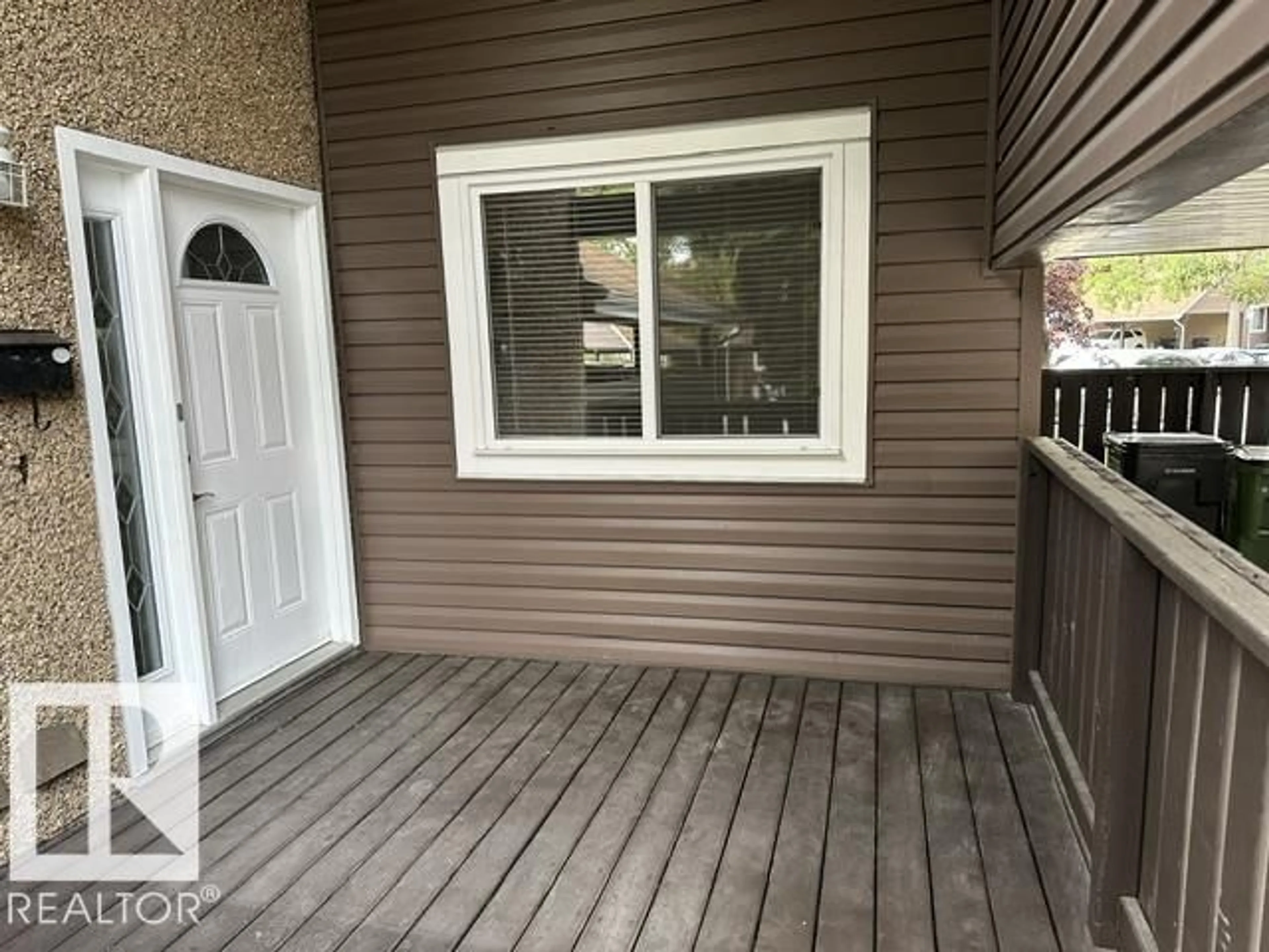 Home with vinyl exterior material, street for 18020 96 AV, Edmonton Alberta T5T3N2